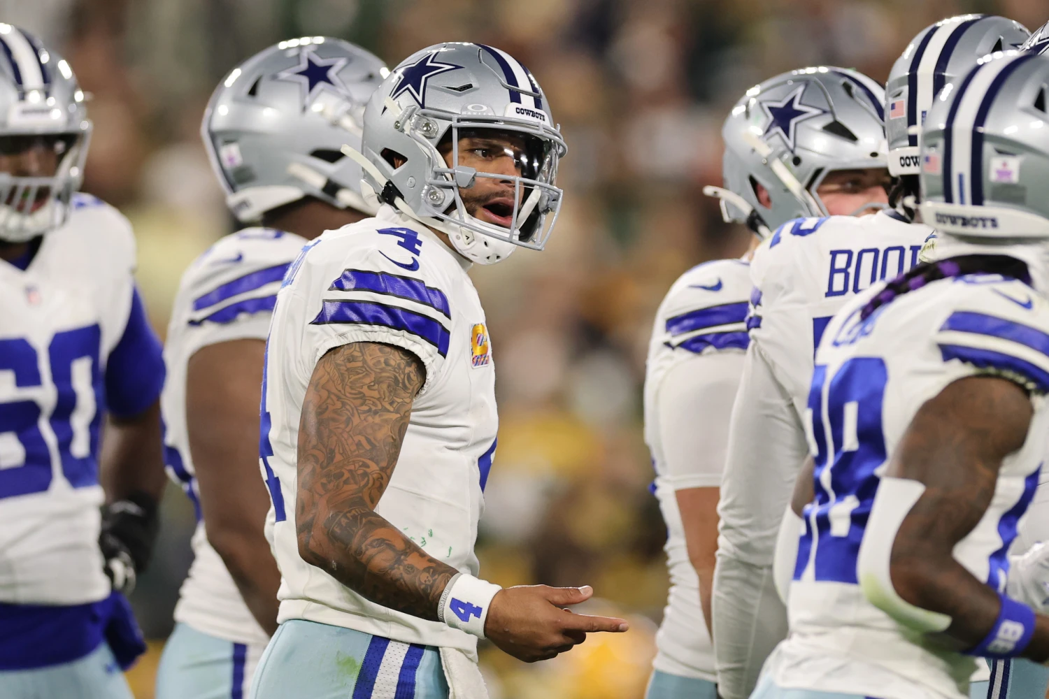 Dallas Cowboys quarterback Dak Prescott reacts during the second quarter against the Green Bay Packers at Lambeau Field.