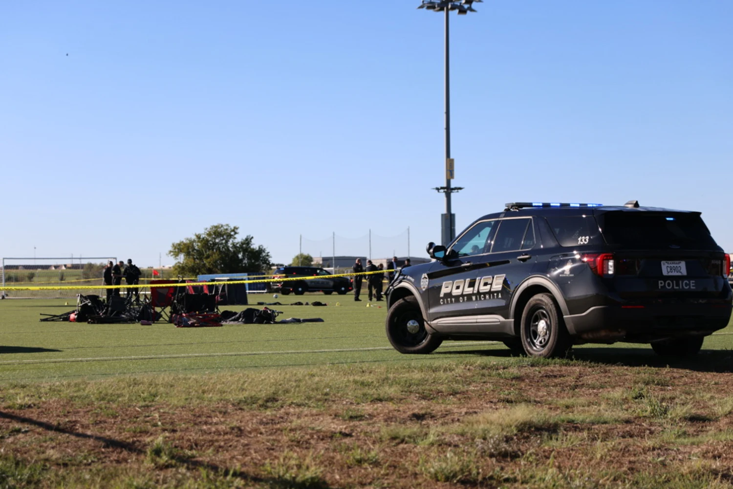 This image shows police on the scene where a person drove a vehicle through a soccer field during a game in Wichita, Kansas, Saturday, Oct. 17, 2026.