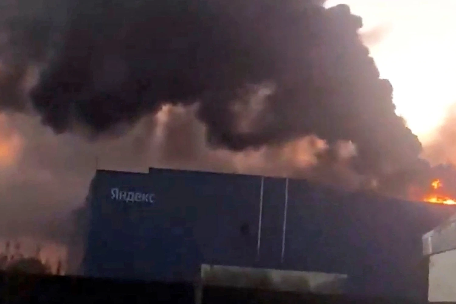 Smoke billows from Yandex's Sasovo hub, one of the company's five large data centres, after a fire following a drone strike forced the suspension of operations at the site, which hosts tens of thousands of servers, Sasovo, Russia, in this screengrab obtained from a social media video on Otober 8, 2026.