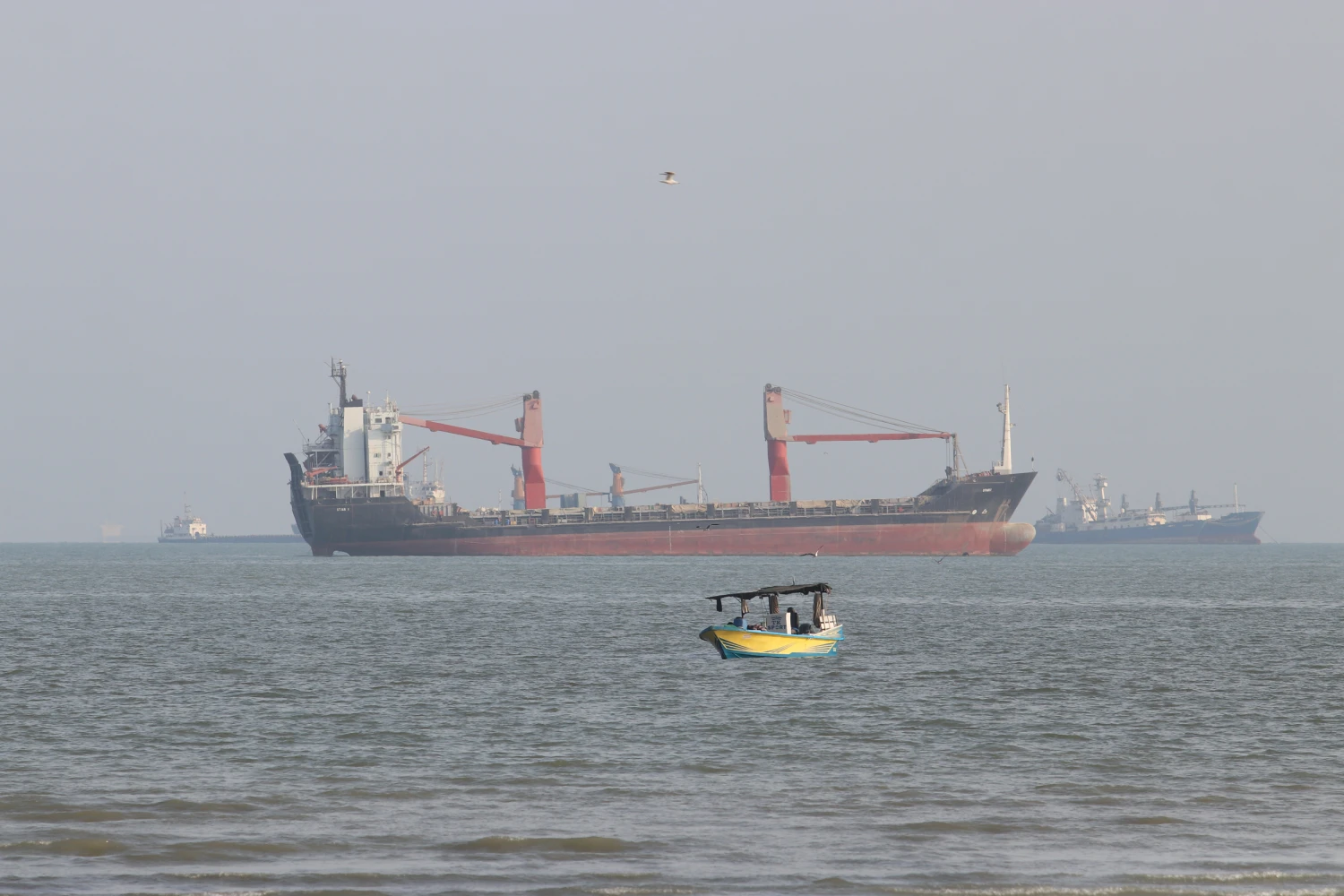 Commercial vessels anchored in the Strait of Hormuz off Bandar Abbas, Iran, on Oct. 13, 2026.