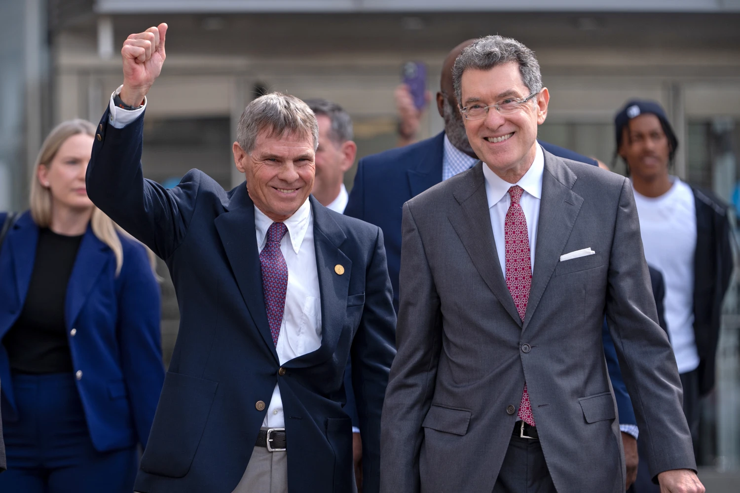 Former Olympic canoeist David Hearn, left, and his attorney Norm Eisen leave the courthouse on Sept. 4, 2026, after charges for allegedly damaging the Lincoln Memorial Reflecting Pool were dismissed.
