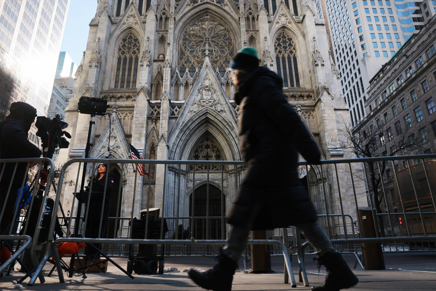 NEW YORK, NEW YORK - FEBRUARY 05: People walk by St. Patrick's Cathedral as Archbishop-designate Ronald Hicks begins the process Thursday of taking over the Archdiocese of New York, succeeding Cardinal Timothy Dolan on February 05, 2026 in New York City. (Photo by Spencer Platt/Getty Images)