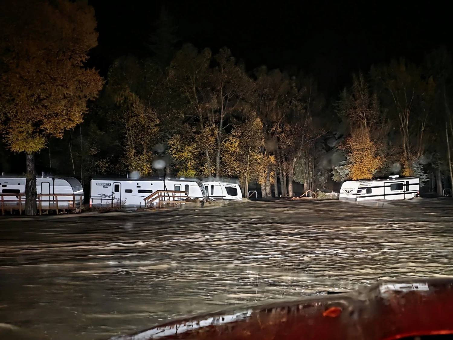 Floodwaters surround several trailers at the Fun Valley Family Resort campground in South Fork, Colorado, on the morning of  October 23, 2026.