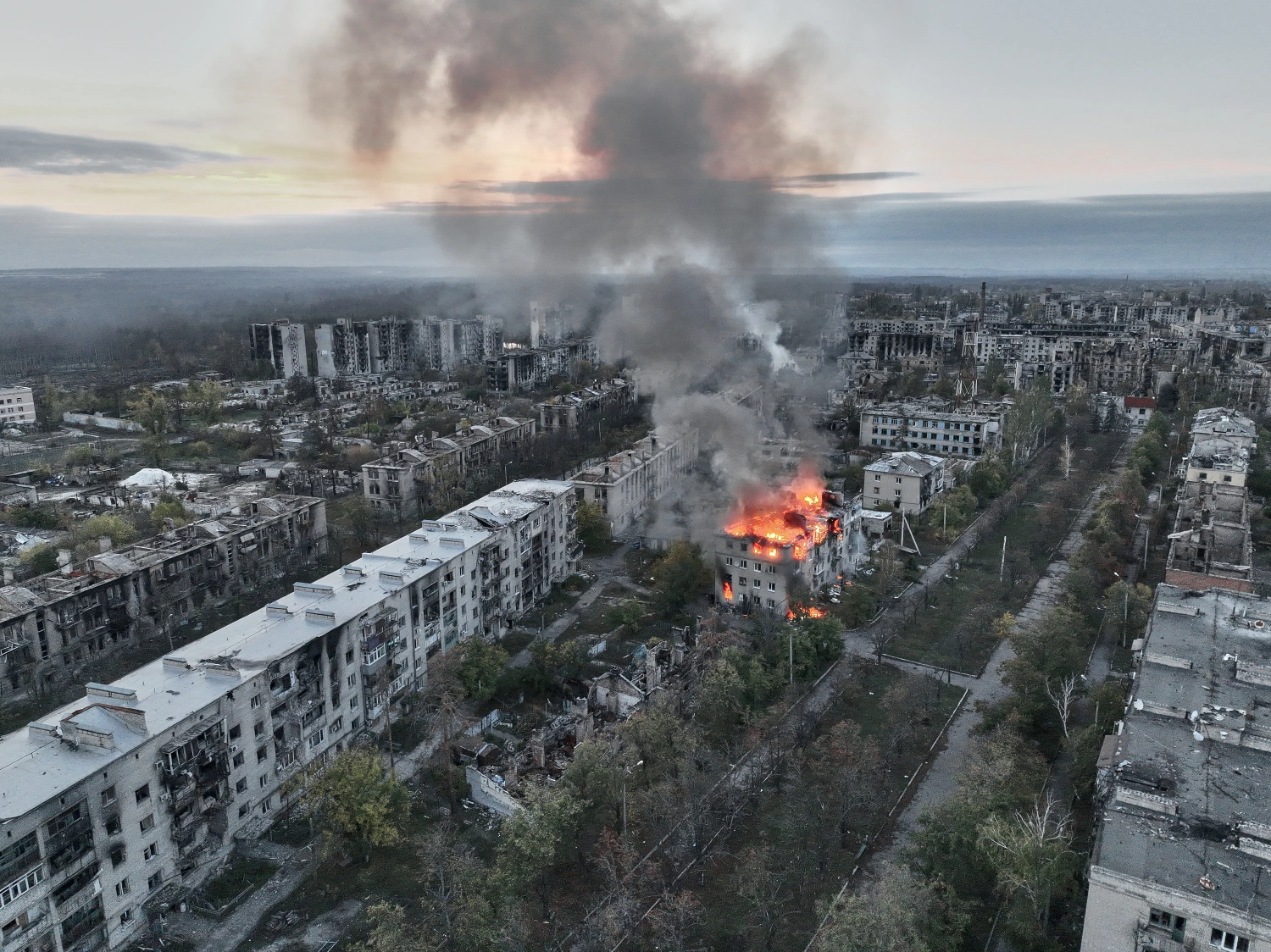 Damaged and destroyed buildings are seen in Lyman, Ukraine on Oct. 23.