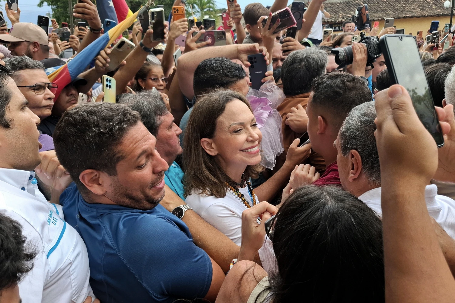 Venezuelan opposition leader Maria Corina Machado greets supporters Sunday in Barquisimeto.