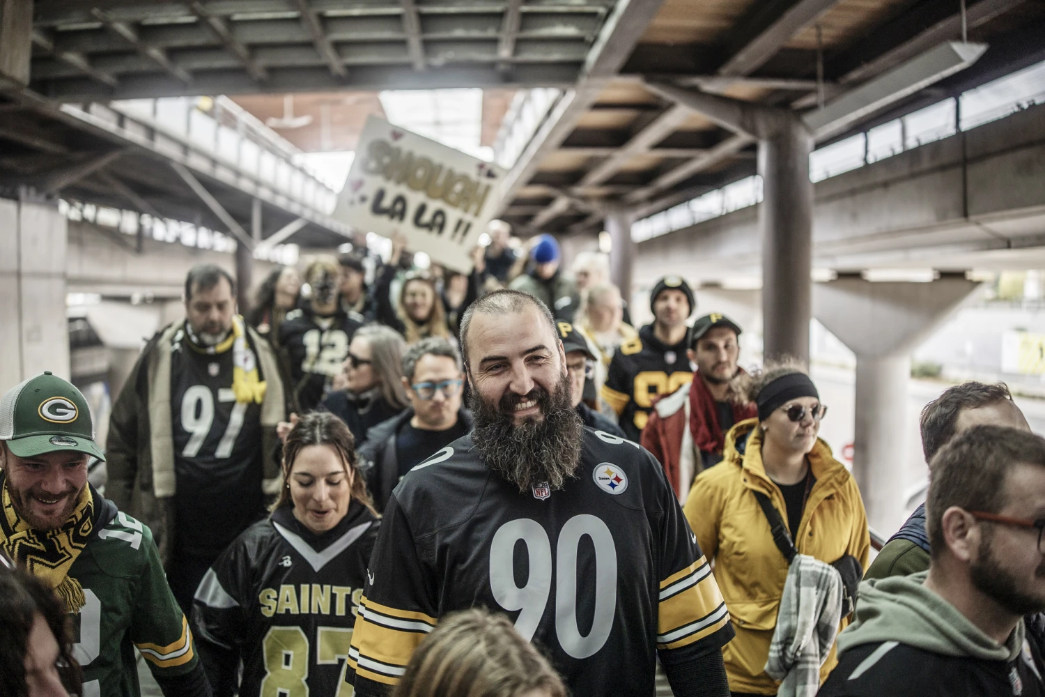 NFL fans outside the Stade de France north of Paris in Saint-Denis, on Sunday. Some said the mass protests in the region were not an issue during their weekend trip.