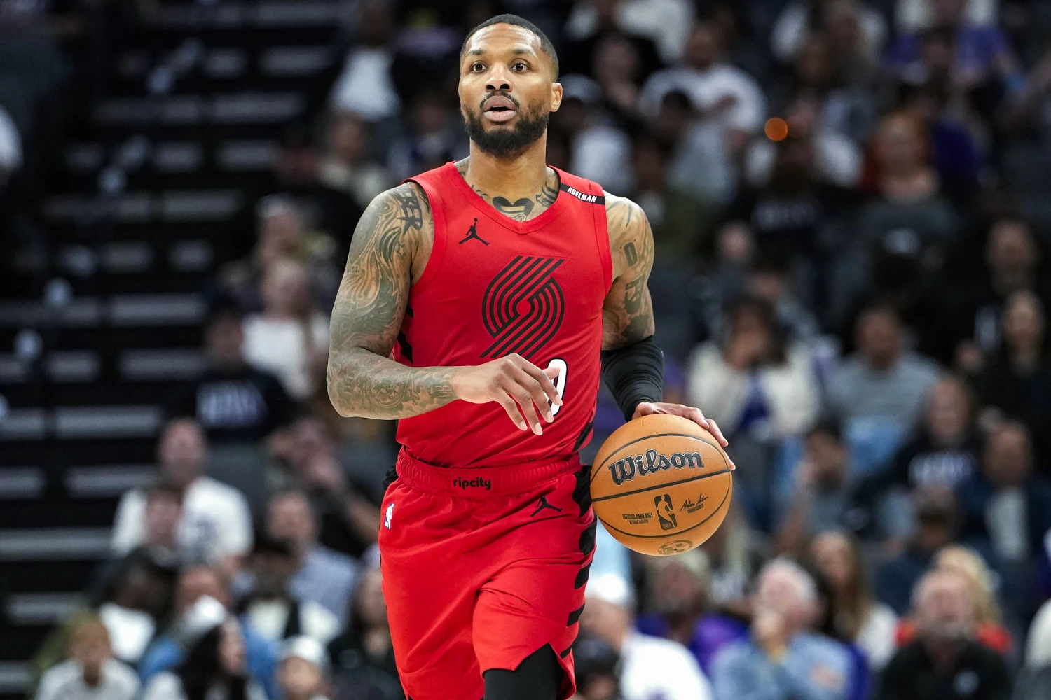 Damian Lillard #0 of the Portland Trail Blazers dribbles the ball up court against the Sacramento Kings in the second half of an NBA basketball game at Golden 1 Center on October 23, 2026 in Sacramento, Calif.
