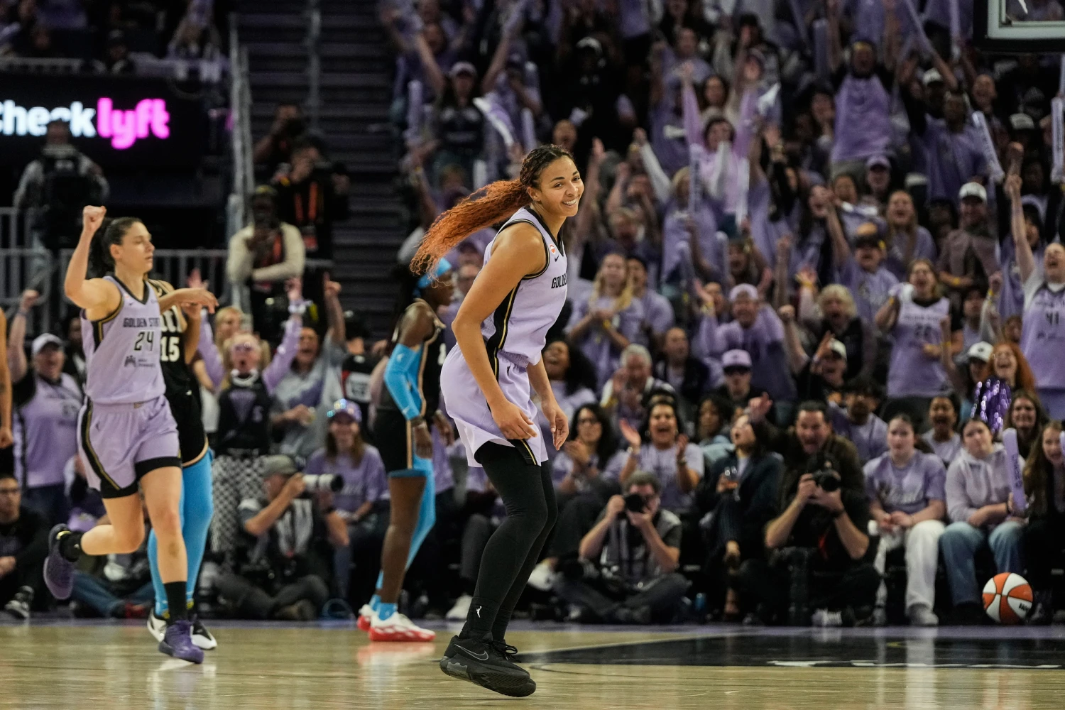 Golden State Valkyries center Kiah Stokes, middle, celebrates after making a 3-point basket during the second half of Game 5 of the WNBA basketball finals against the Atlanta Dream, Monday, Oct. 26, 2026, in San Francisco.