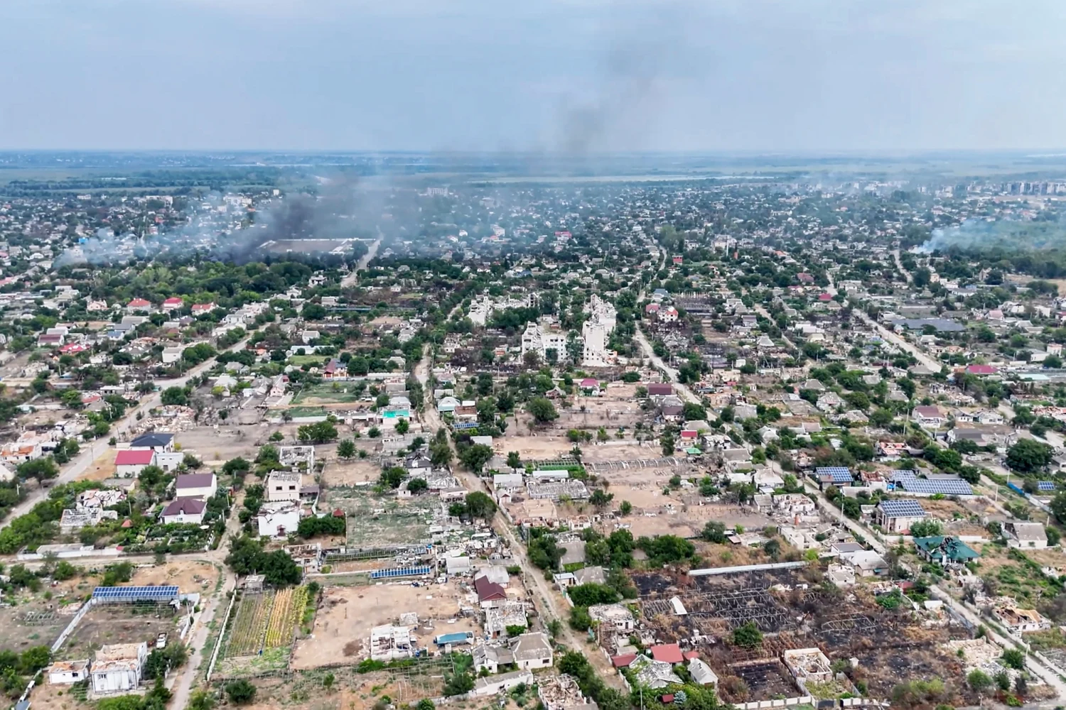 In this undated image from video provided by the Ukrainian 34th Separate Marine Brigade "Borysfen" on Sept. 22, 2026, smoke rises from a residential neighborhood in the Russian-occupied city of Oleshky in the Kherson region of Ukraine.