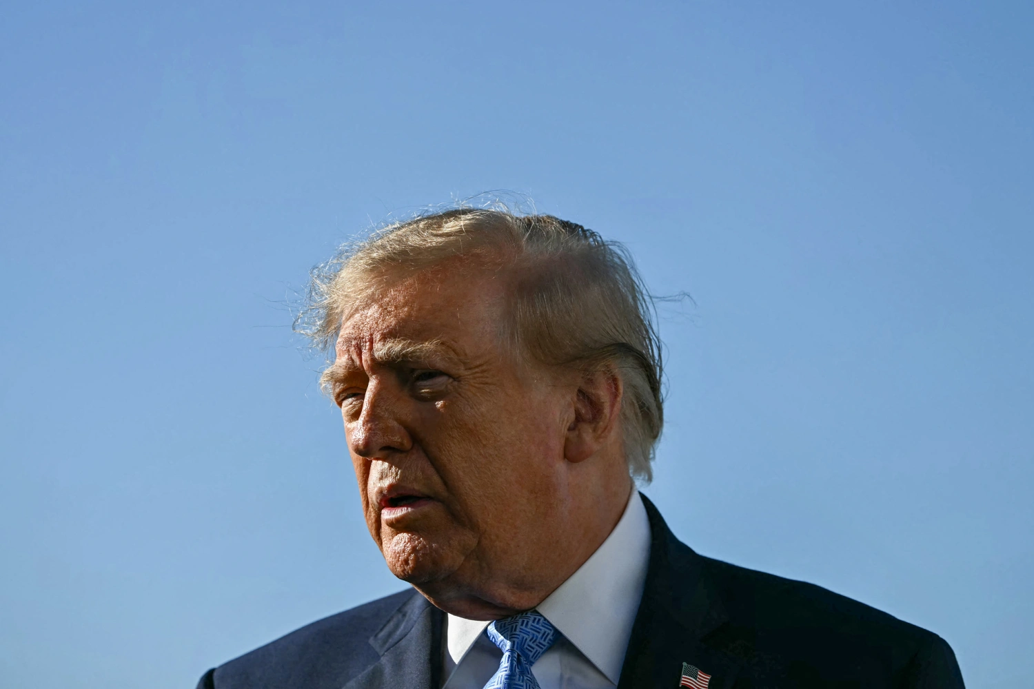 US President Donald Trump speaks to the press before boarding Air Force One at Joint Base Andrews, Md, on Oct., 26, 2026.