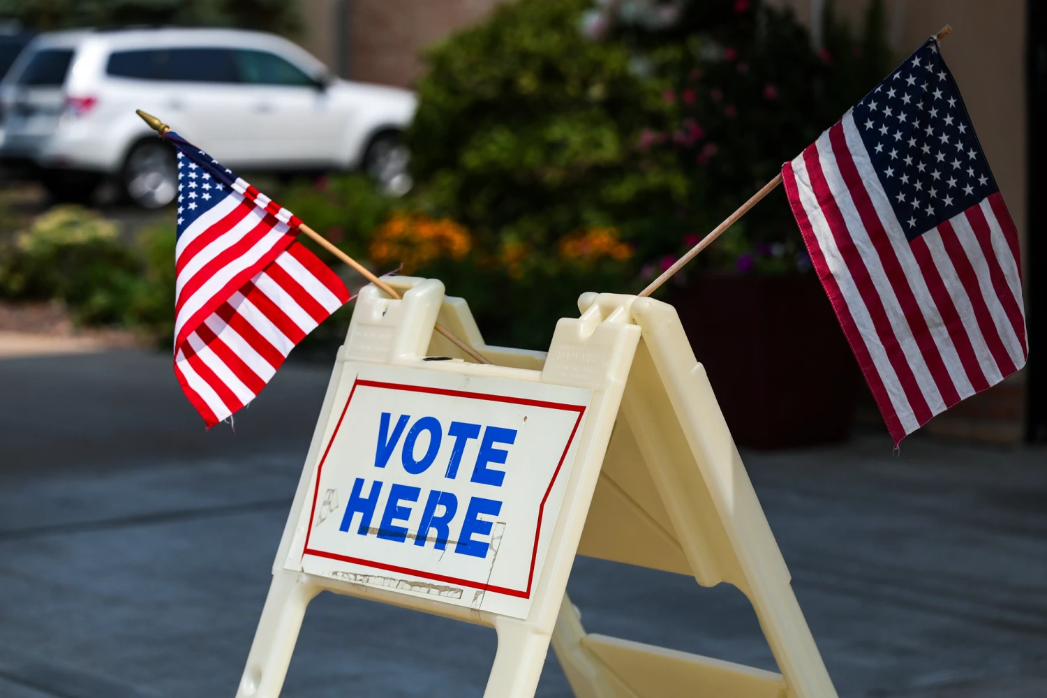 "Vote Here" signage outside a polling location during a primary election in Eau Claire, Wis., on Aug. 11, 2026.