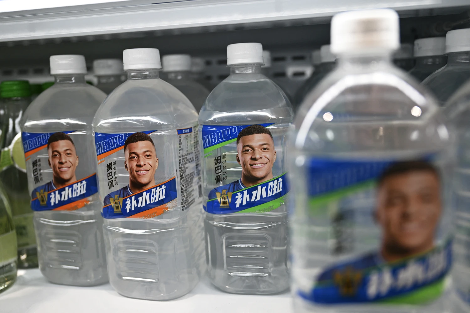 Dongpeng electrolyte drinks featuring Mbappé at a convenience store in Beijing on Tuesday.
