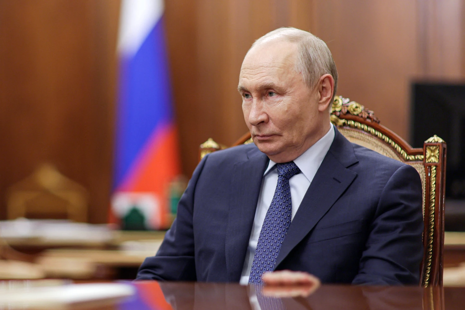 Russia's President Vladimir Putin attends a meeting with Russia's bank Gazprombank chief in Moscow on October 26, 2026