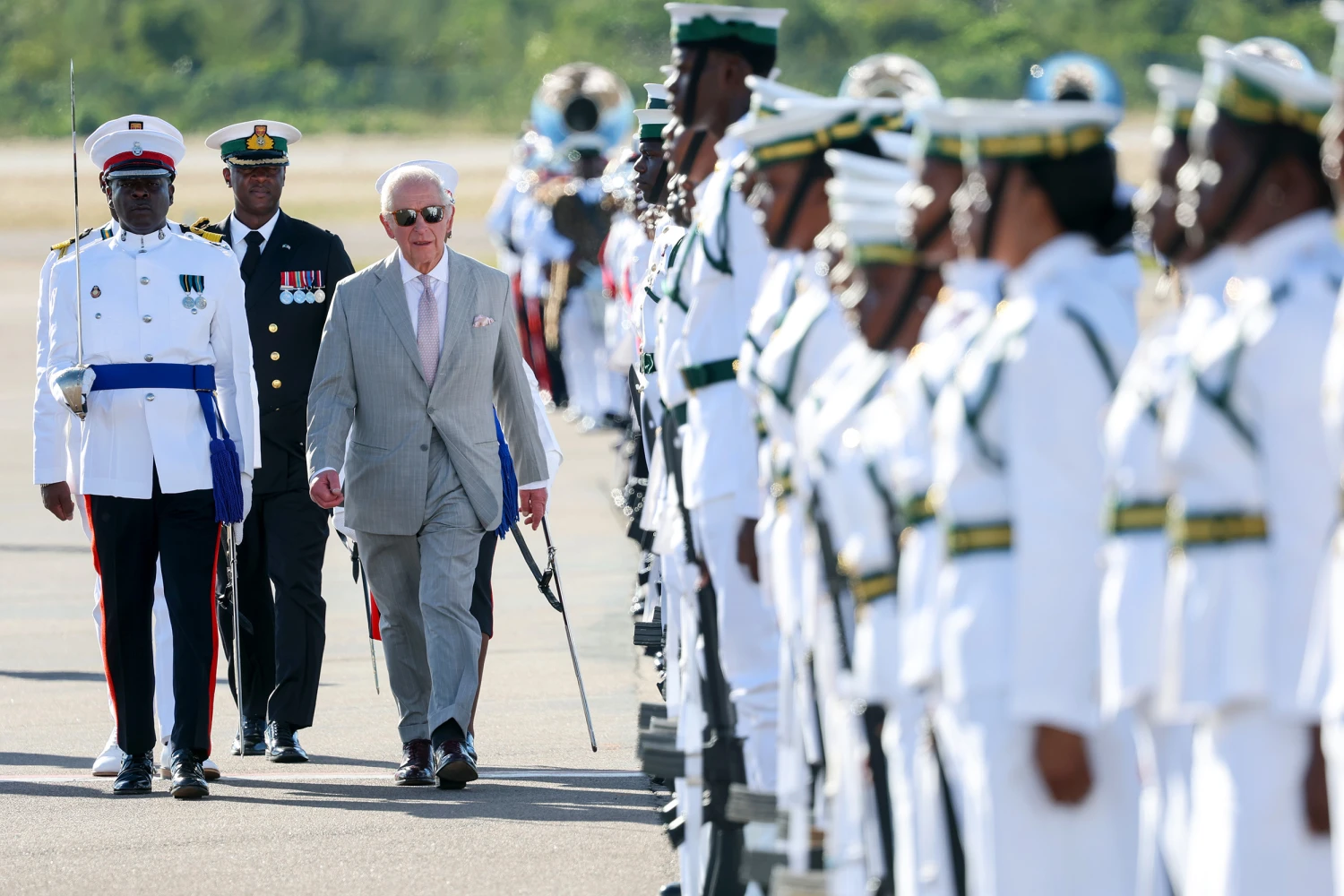 King Charles III inspects a Guard of Honour during his visit to The Bahamas on October 27, 2026 in Nassau, Bahamas.