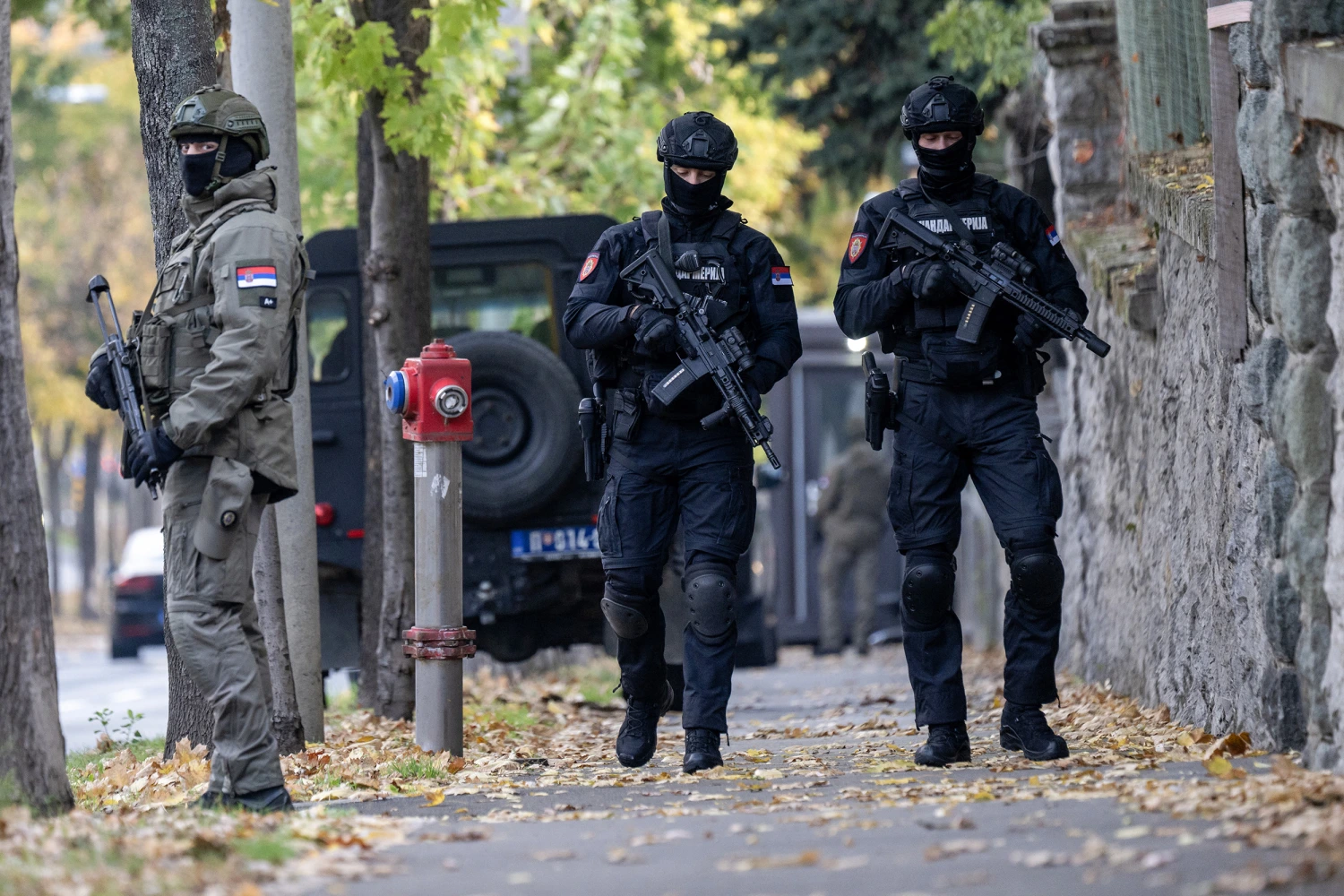Serbian police stand guard at the entrance to the Israeli embassy in Belgrade on Wednesday.