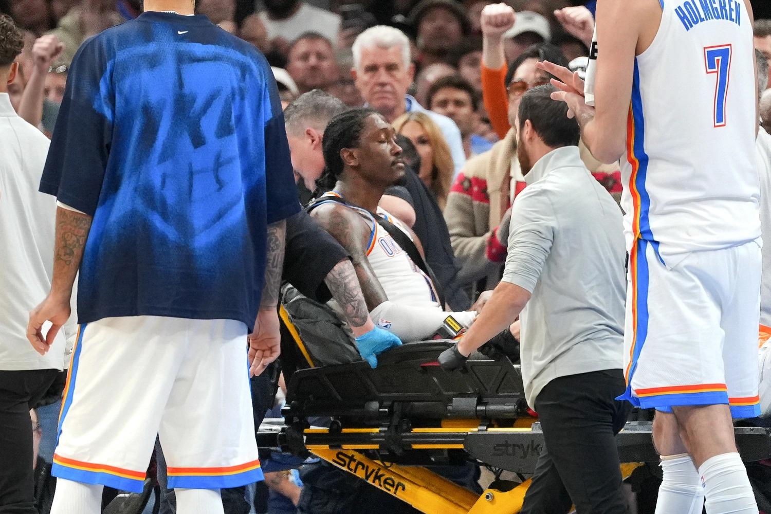 Oklahoma City Thunder guard Jalen Williams is taken off the court by medical staff during the second half of an NBA basketball game against the Los Angeles Clippers, Sunday, Oct. 25, 2026, in Oklahoma City.