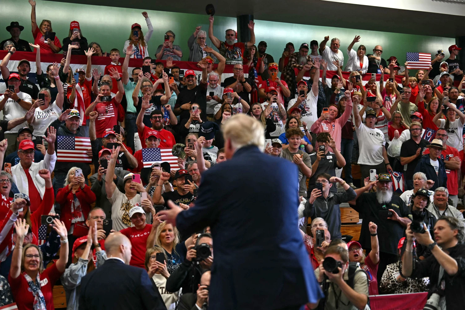 Supporters cheer as President Donald Trump says goodbye after speaking during a midterm campaign rally at Shoemaker Center in Chillicothe, Ohio on Oct. 28, 2026.