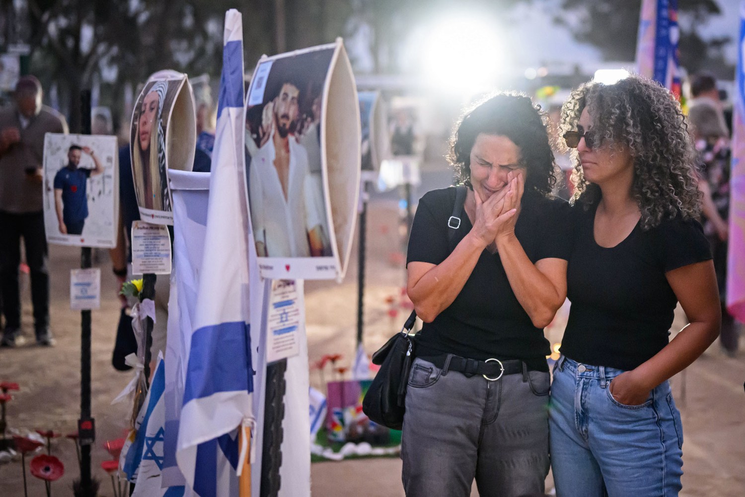 Loved ones of the lost and kidnapped gather at the site of the Nova Festival on Oct. 7, 2024 in Re'im, Israel.