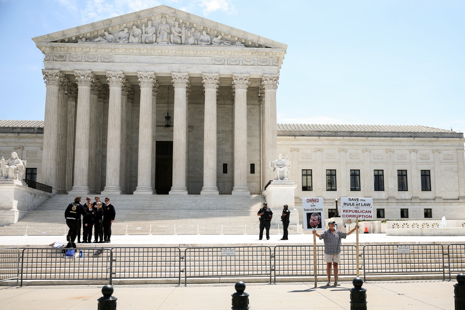 A protester demonstrates outside of the U.S Supreme Court on June 25, 2026 in Washington.