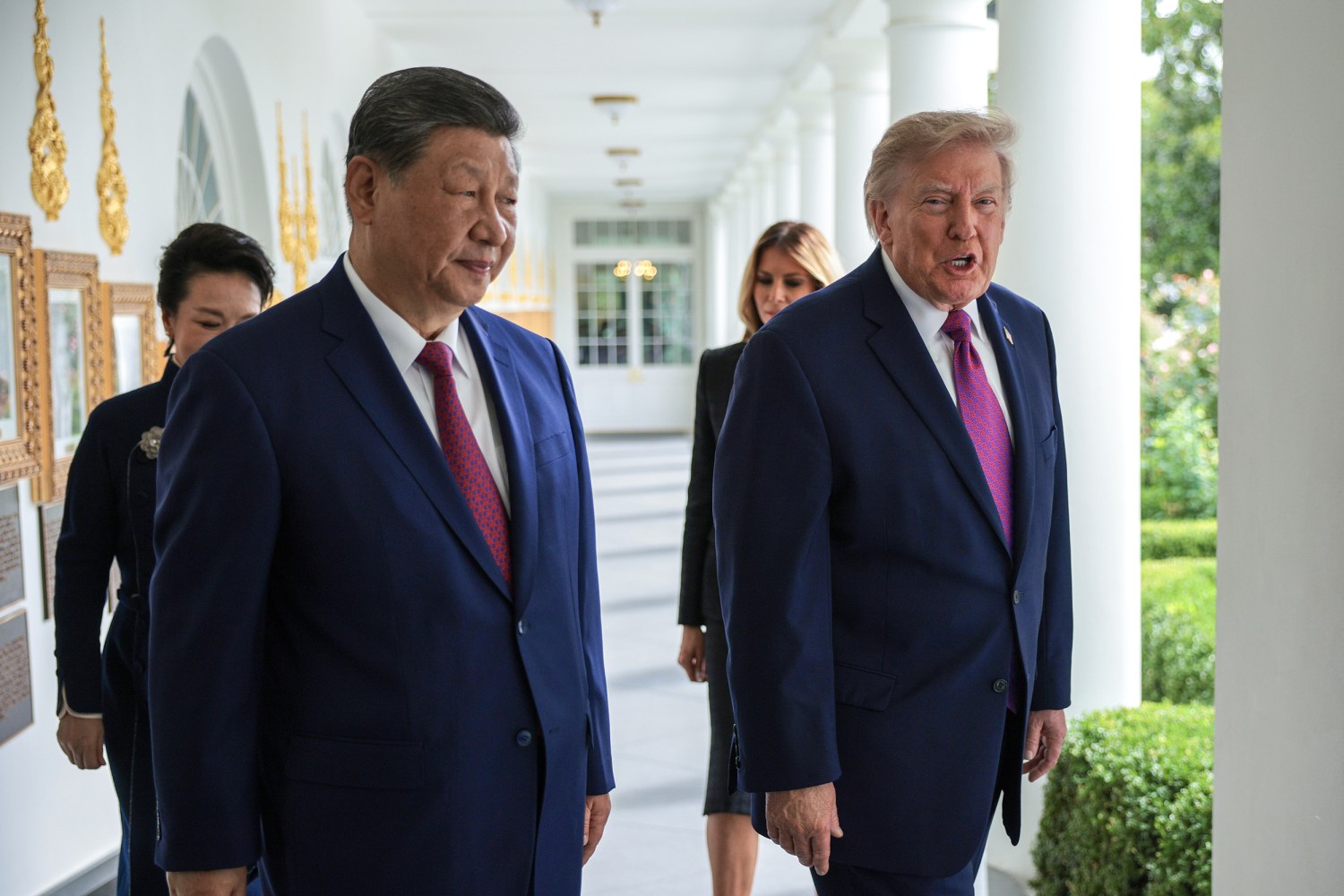 President of China Xi Jinping and U.S. President Donald Trump walk along the colonnade to watch a military review at the White House on September 24, 2026 in Washington.