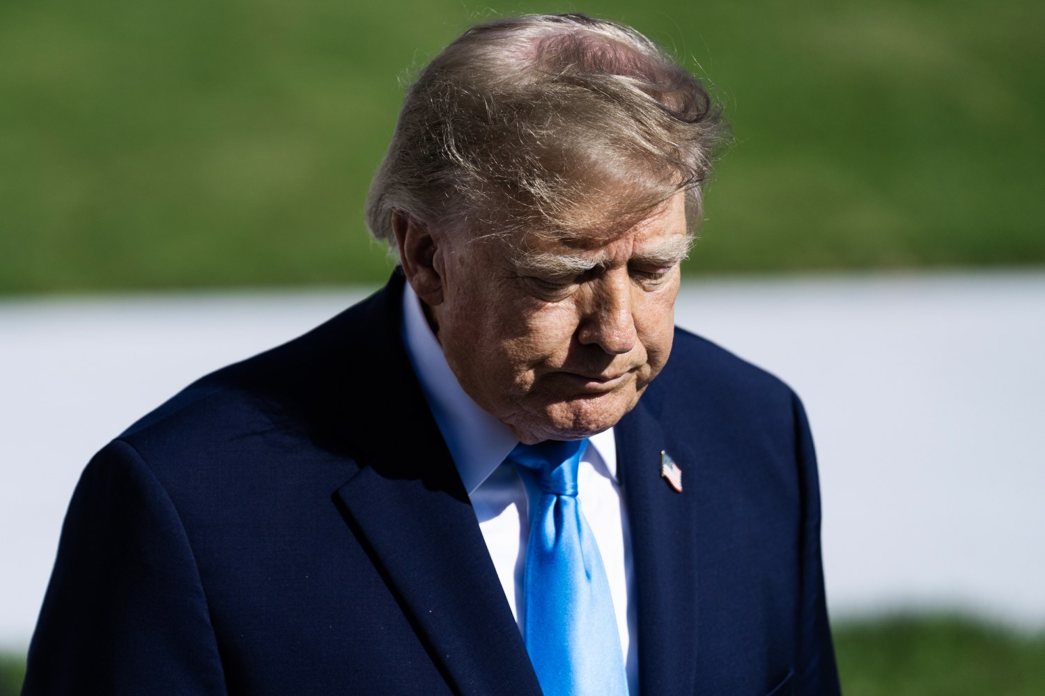 President Donald Trump speaks with reporters on the South Lawn of the White House before boarding Marine One en route to Nebraska on Oct. 5, 2026.