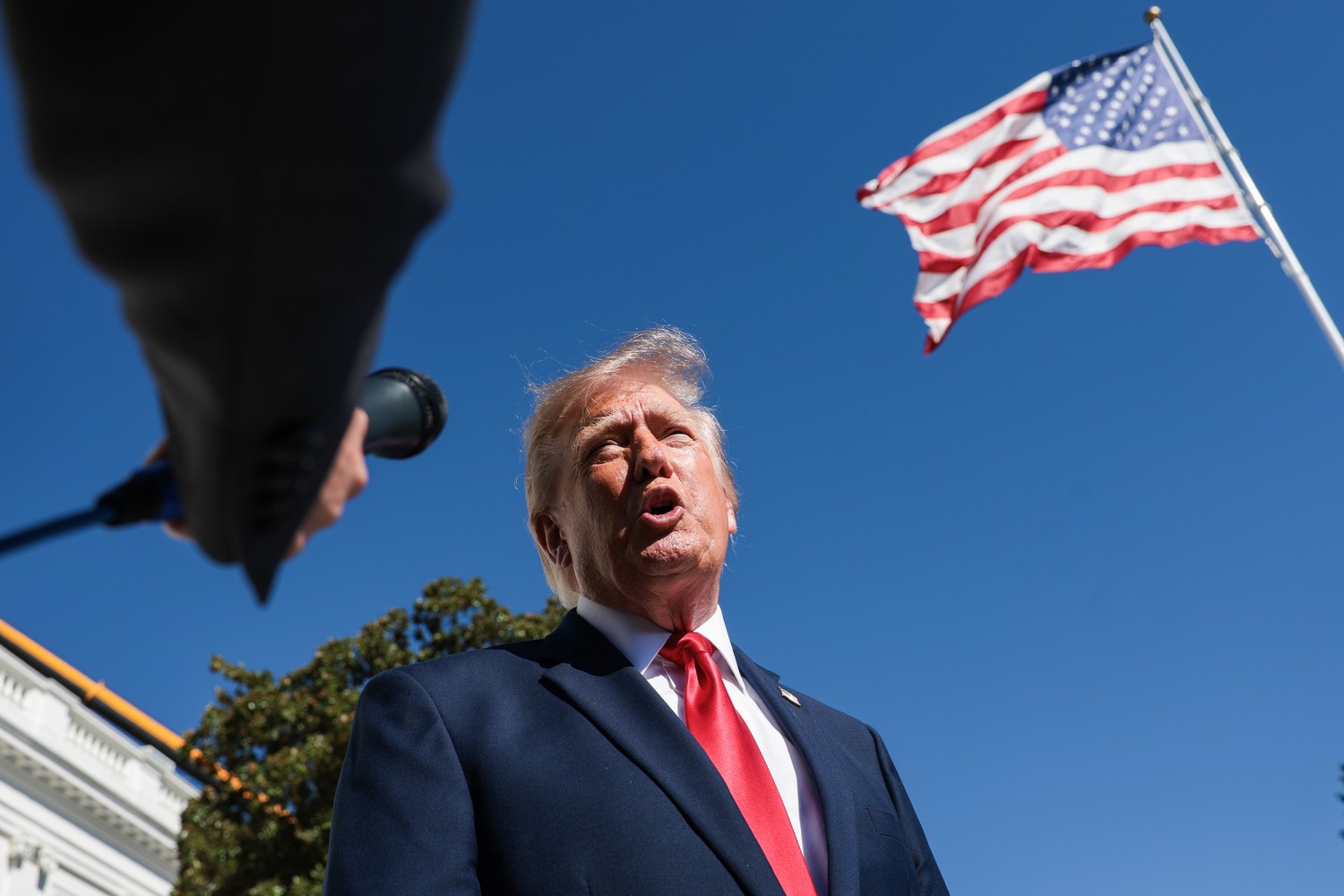 President Donald Trump speaks to reporters before boarding Marine One on the South Lawn of the White House on October 07, 2026 in Washington, DC.