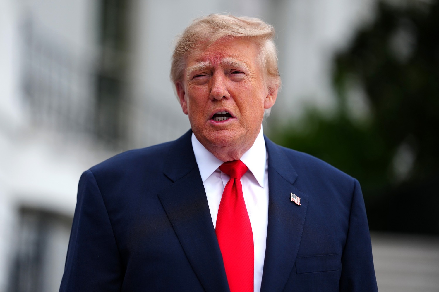 President Donald Trump speaks to members of the media as he departs the White House on the South Lawn on October 10, 2026 in Washington, DC.