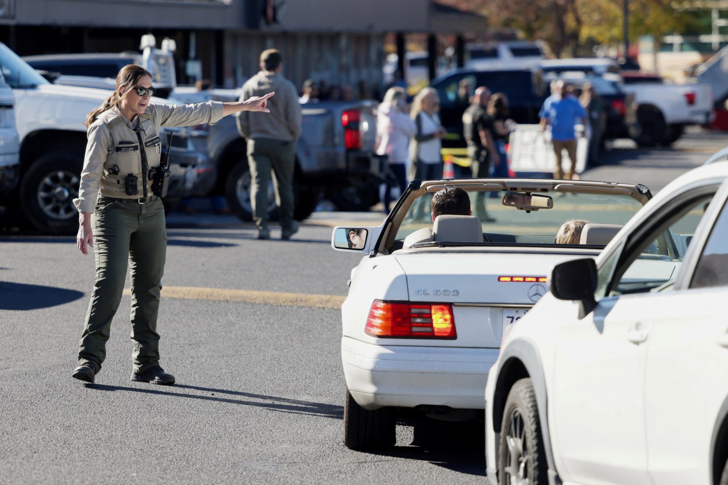 Emergency personnel direct traffic at the Journey Church family reunification location following a shooting at Silver Rail Elementary School in Bend, Ore., on Oct. 15, 2026.
