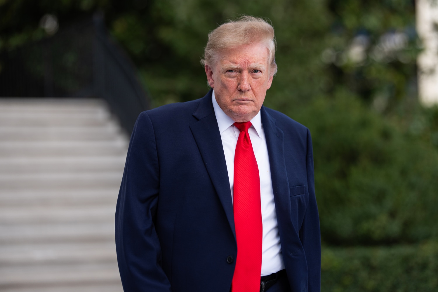 U.S. President Donald Trump walks on the South Lawn as he departs the White House on October 12, 2026 in Washington, D.C.