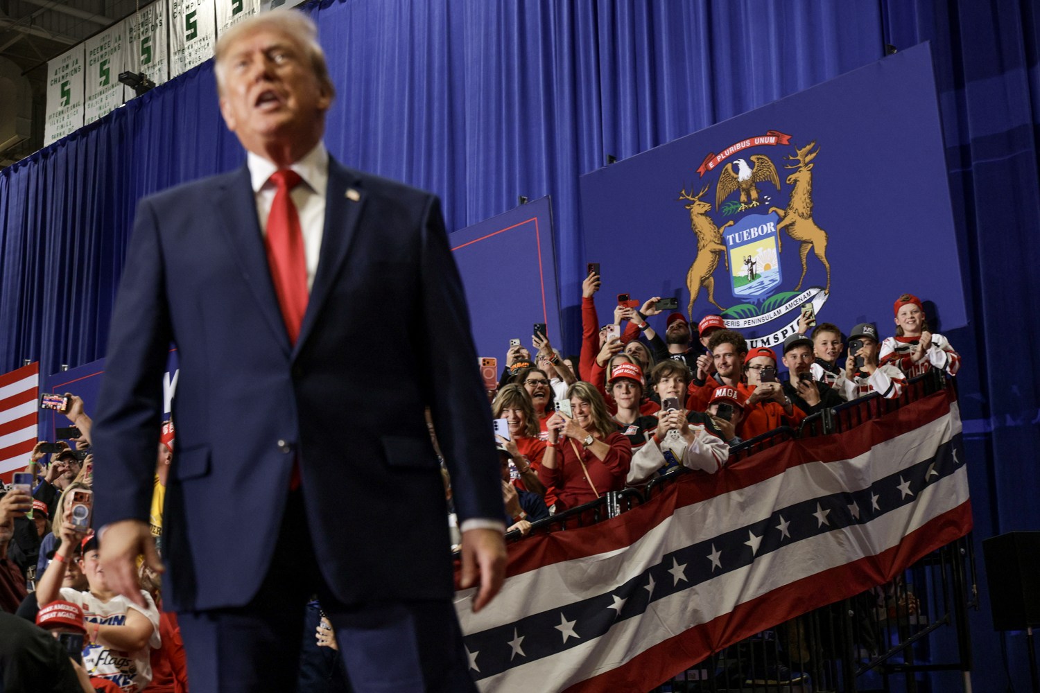 President Donald Trump takes the stage during an election rally at McMorran Place Sports & Entertainment Center in Port Huron, Mich., on October 25, 2026.