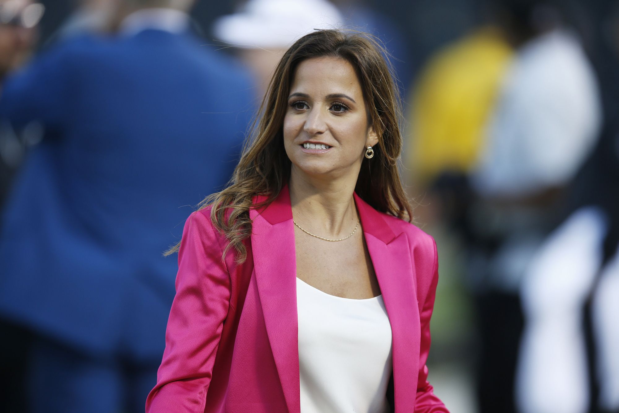 ESPN reporter Dianna Russini on the sidelines before the start of an NFL football game between the Oakland Raiders and the Denver Broncos September 9, 2019, in Oakland, California.