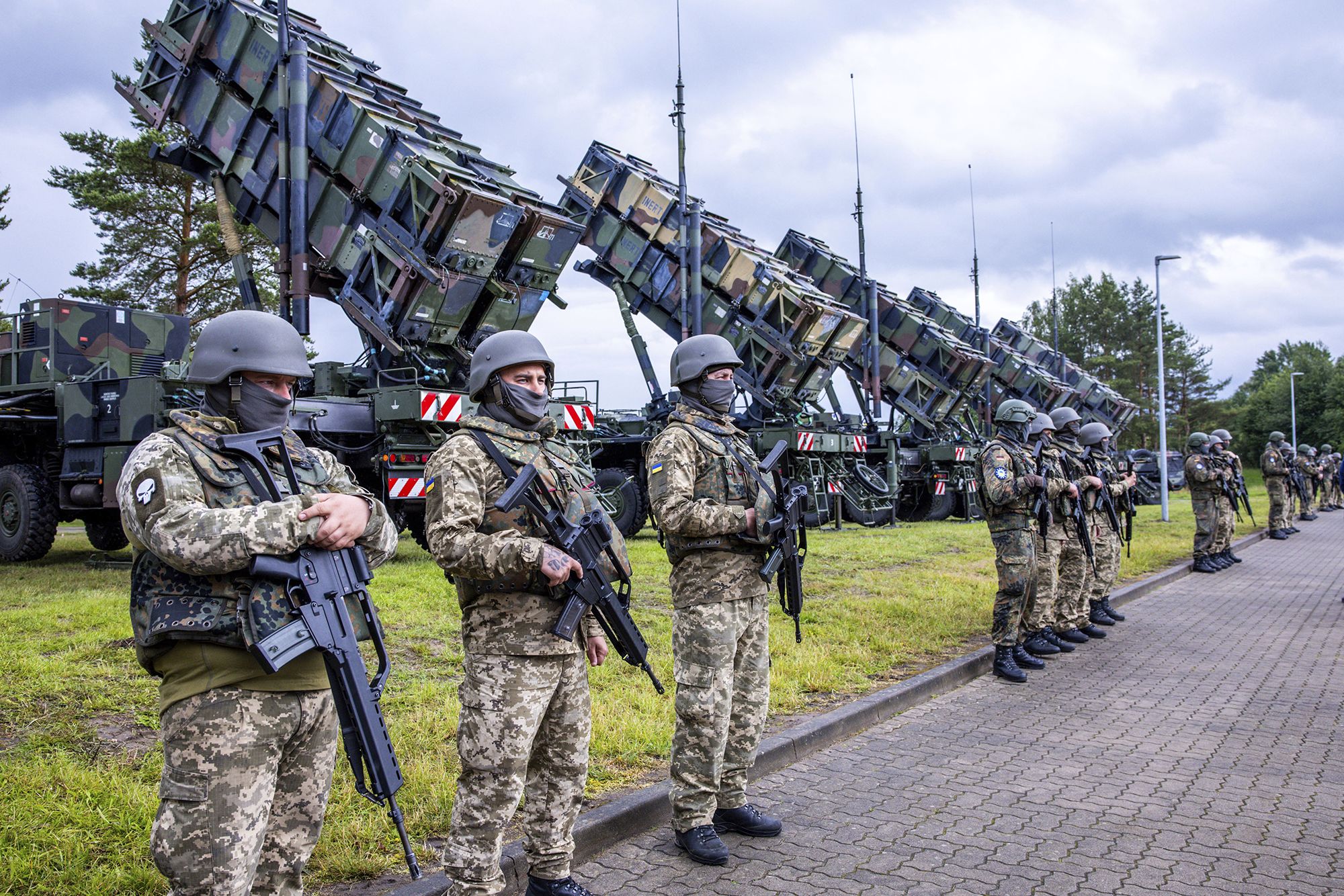 Ukrainian soldiers stand at a military training ground during training on the Patriot air defense missile system in Mecklenburg-Western Pomerania, Germany, on June 11, 2024.