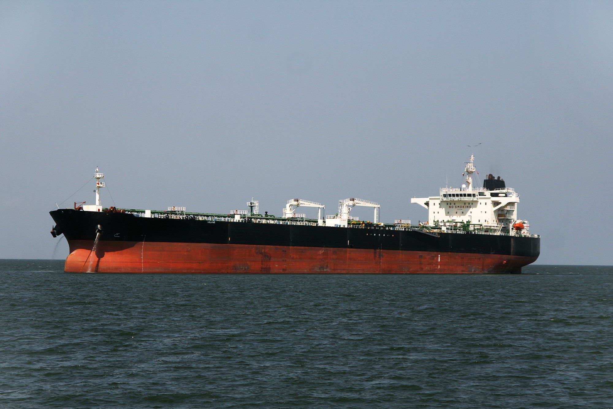 An oil tanker chartered by Chevron is anchored in Lake Maracaibo, awaiting the loading of crude oil, in Cabimas, Venezuela, on February 16.