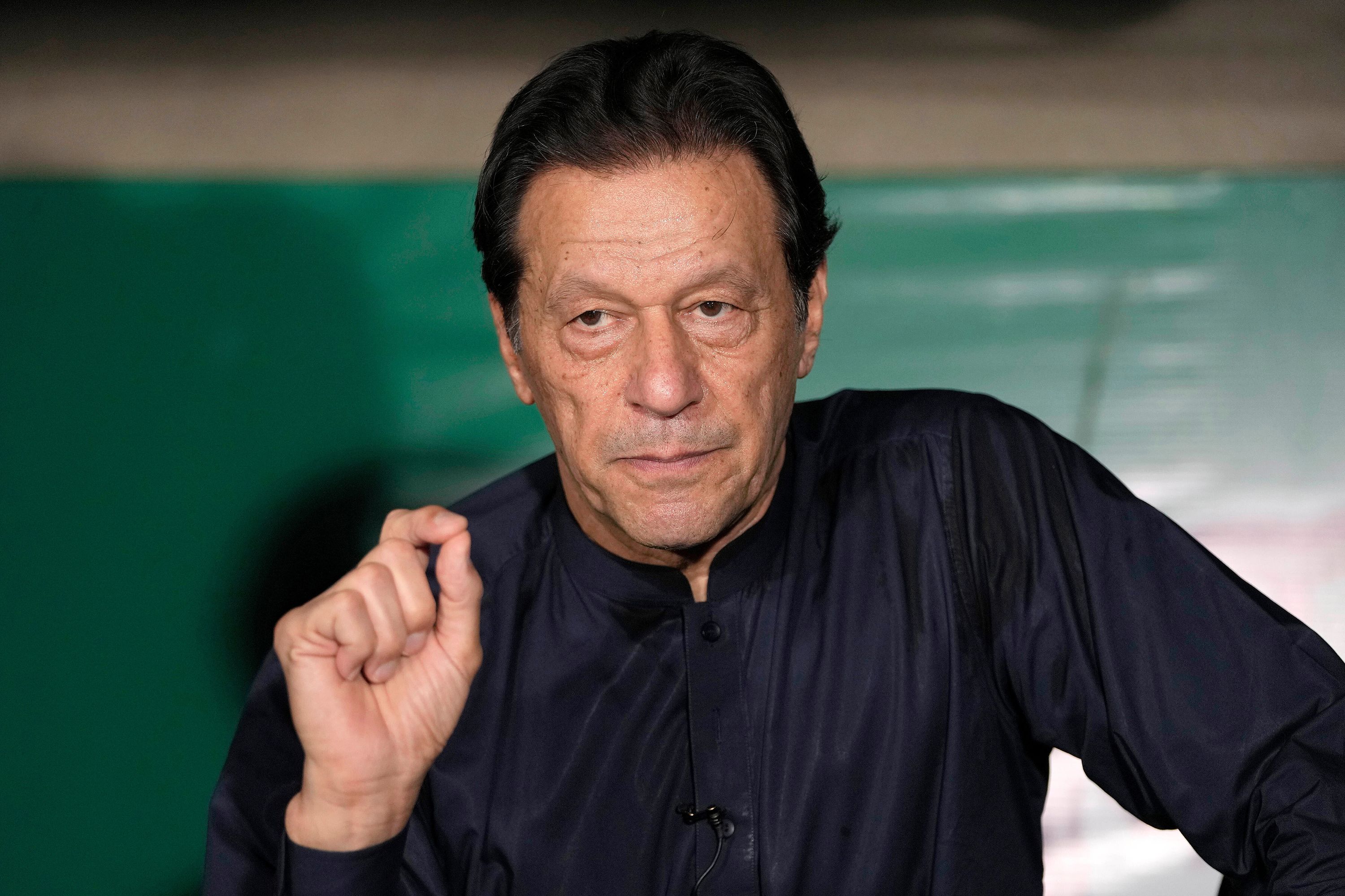 Pakistan's former Prime Minister Imran Khan gives a press conference at his home, in Lahore, Pakistan, on May 18, 2023.