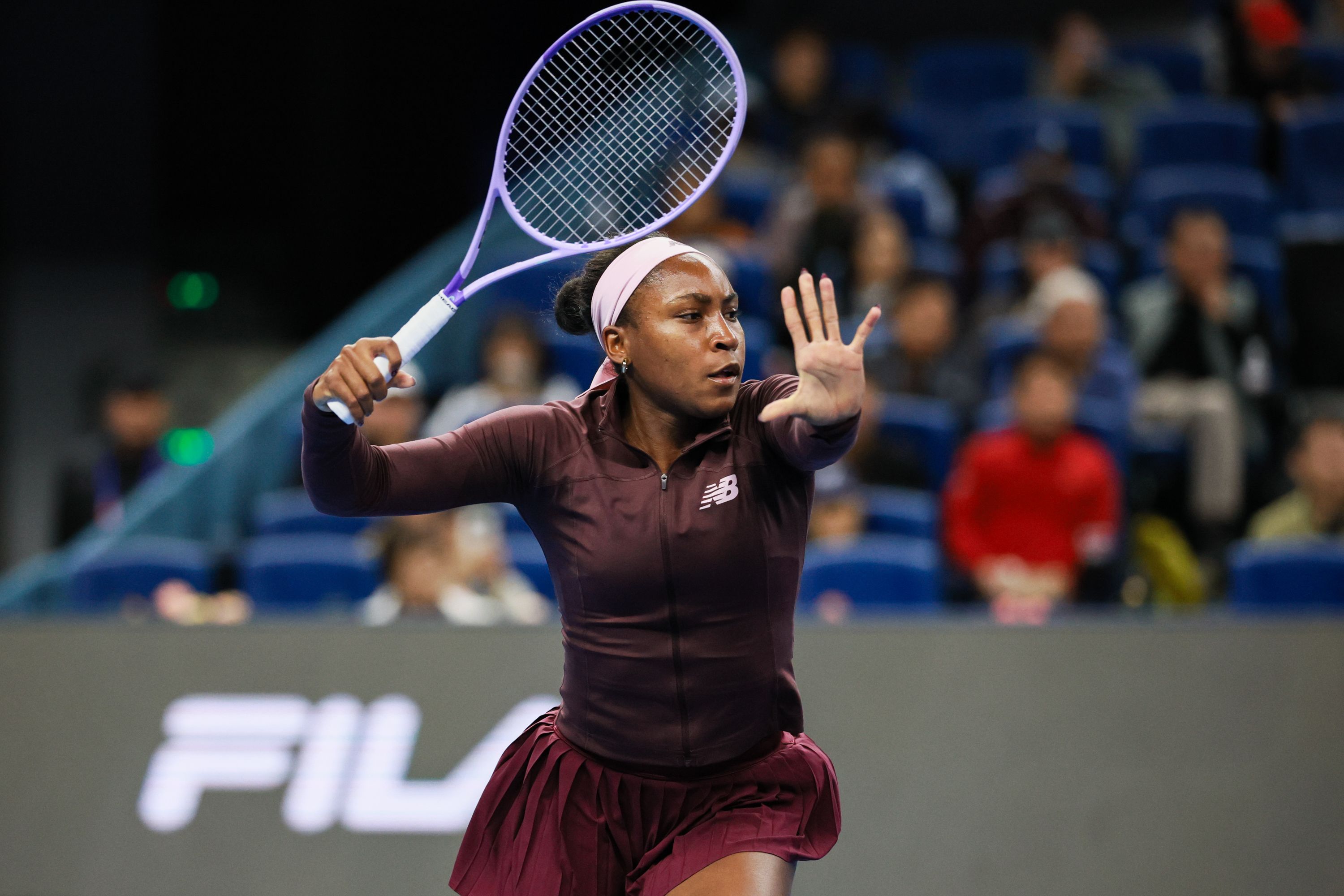 BEIJING, CHINA - OCTOBER 05: Sun Xinran of China competes against Coco Gauff of the United States during the women's singles third round match on day three of the China Open 2026 on October 5, 2026 in Beijing, China. (Photo by VCG/VCG via AP )