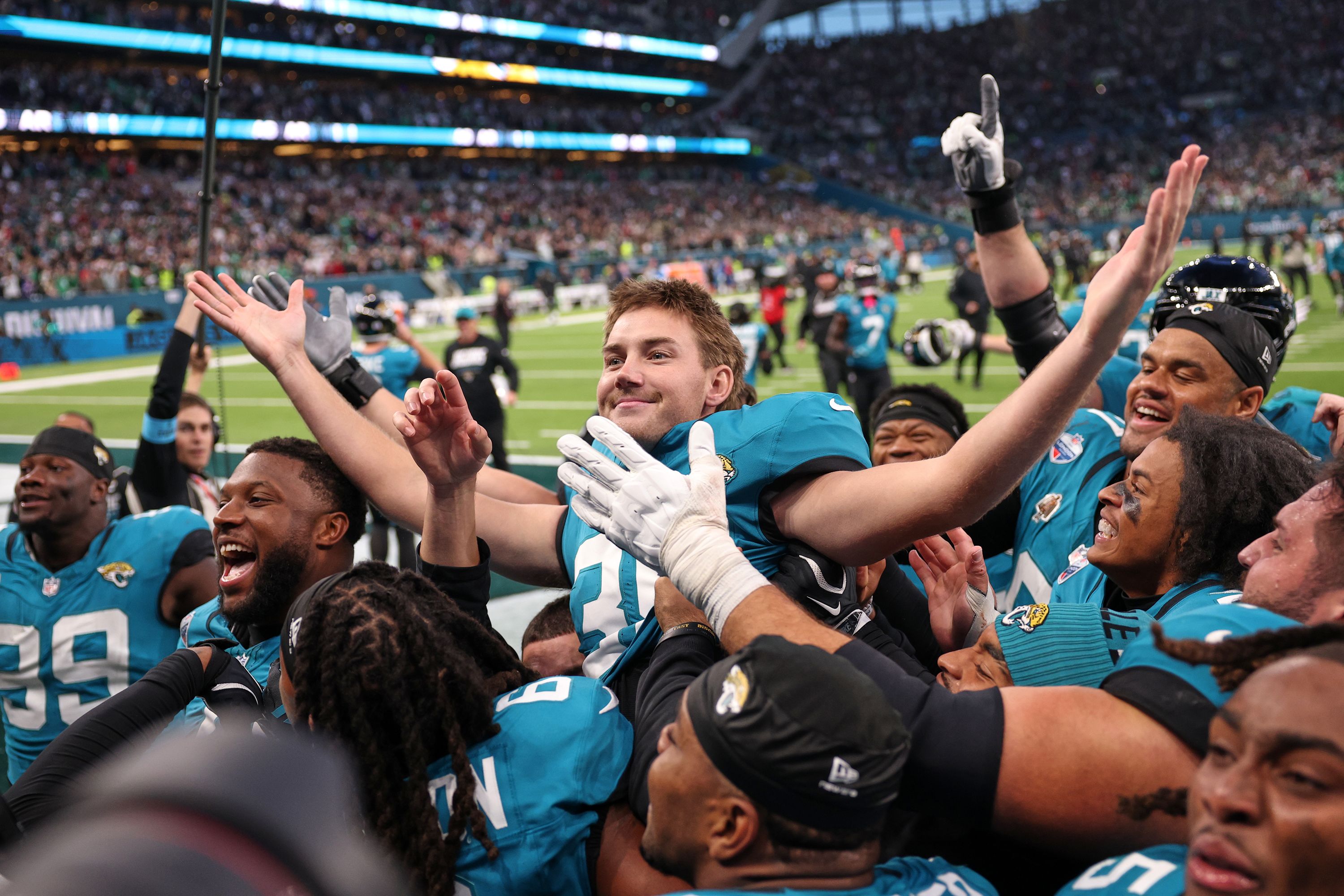 Jacksonville Jaguars place kicker Cam Little (39) celebrates after scoring the winning field goal against the Philadelphia Eagles in London, on Sunday, Oct. 11.