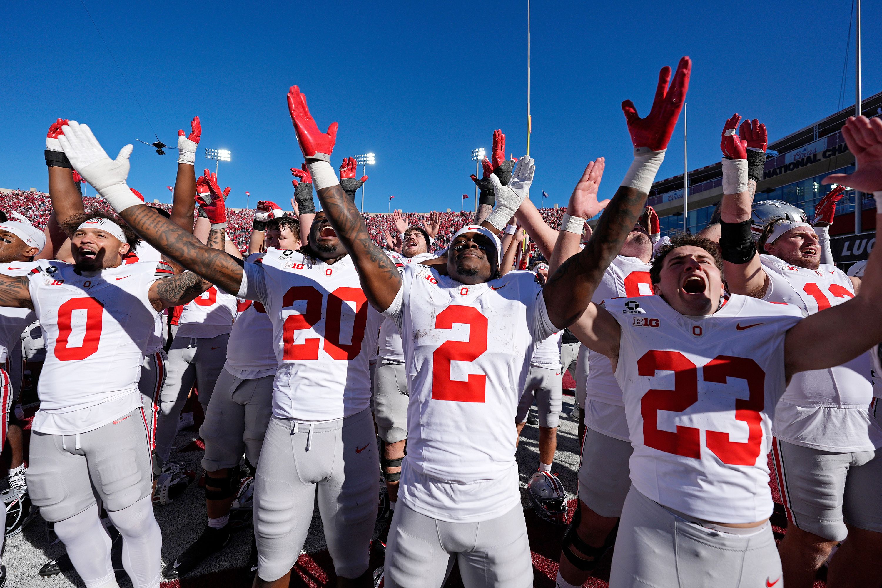 Ohio State Buckeyes players celebrate after a win during the college football game against the Indiana Hoosiers on Saturday.