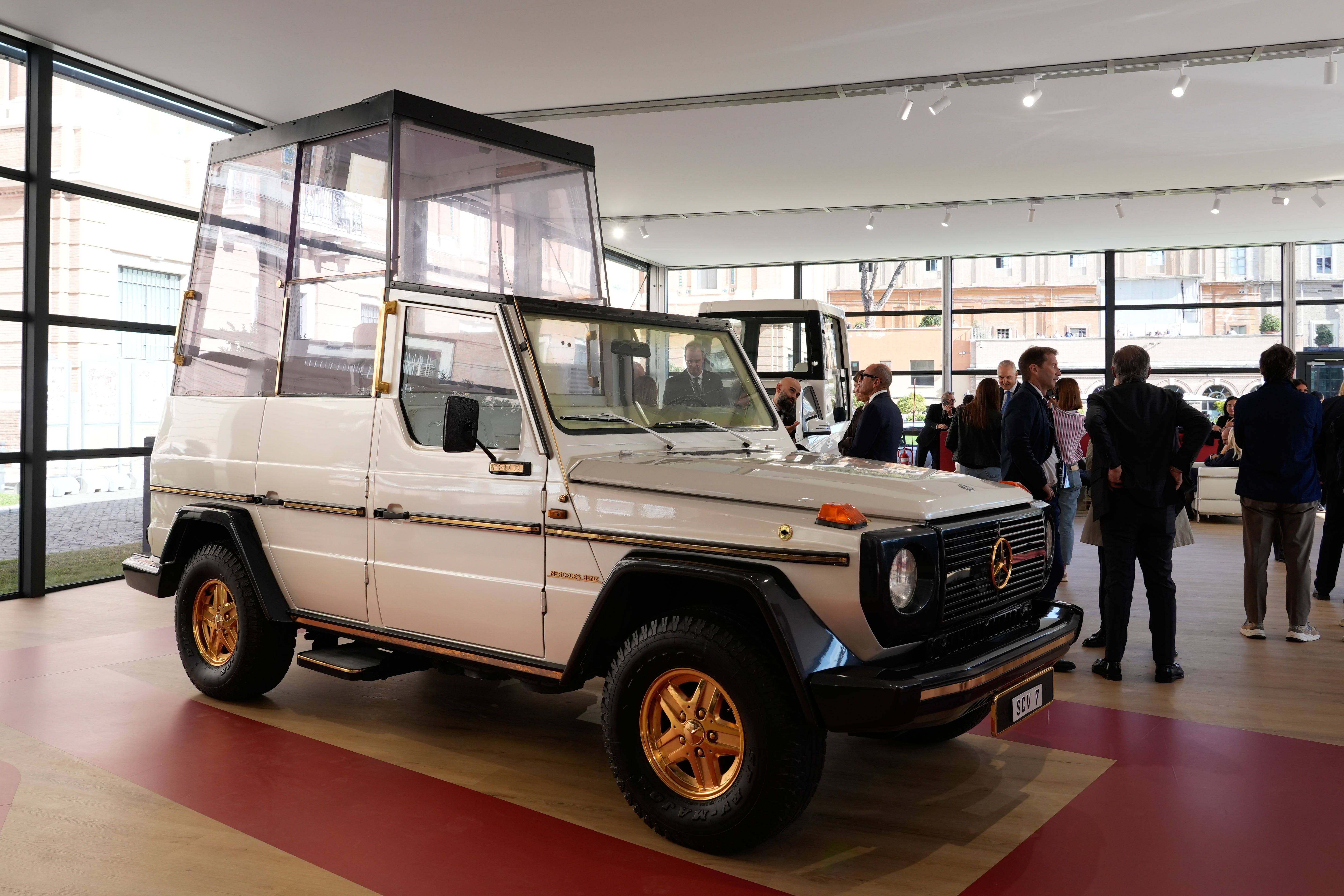 From Pope Pius XI's first automobile in 1930 to modern popemobiles showcased at The Vatican.