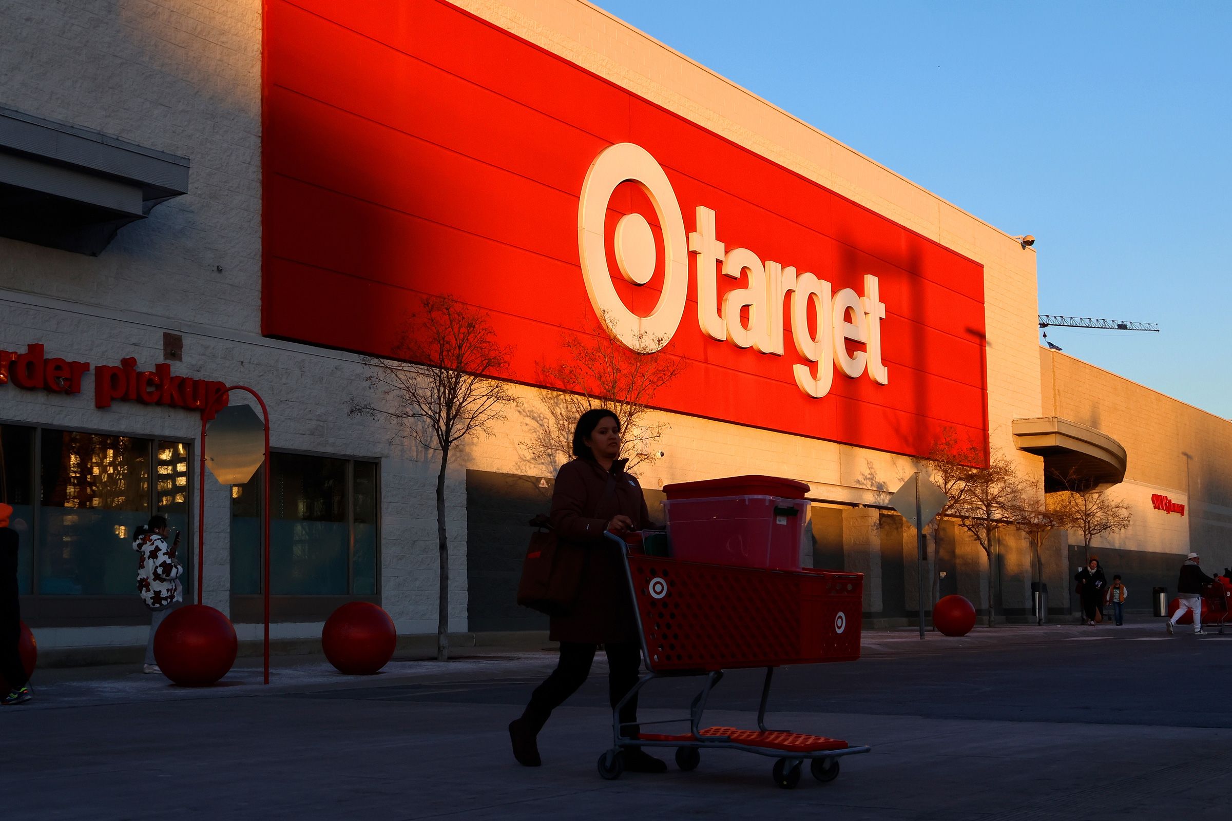 The sun sets on a Target corporate logo sign outside their retail store on January 1, 2026, in Jersey City, New Jersey.