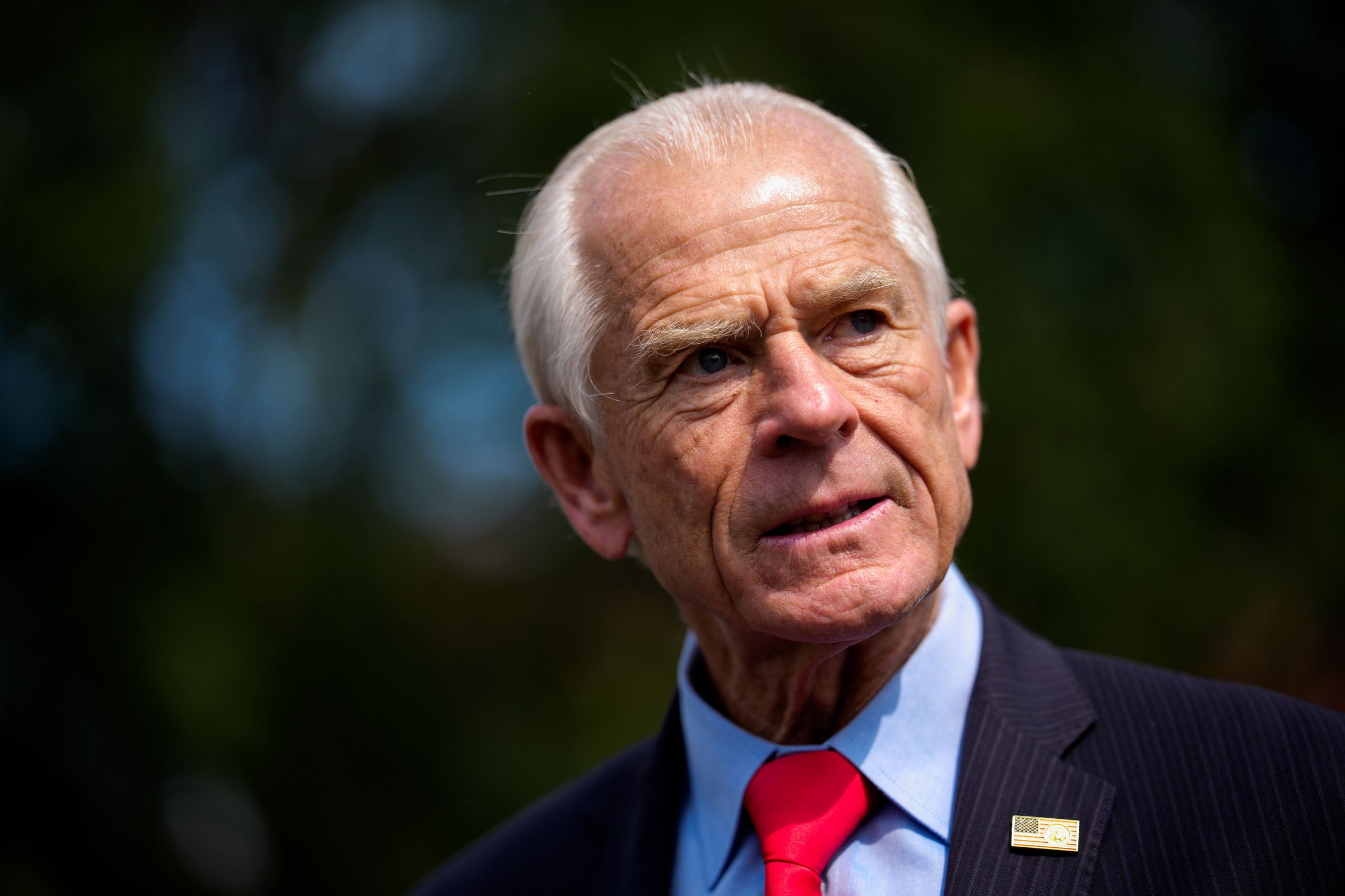 White House senior counselor for trade and manufacturing Peter Navarro takes a question from a reporter following an on camera interview on the North Lawn of the White House on August 11, 2026 in Washington, DC.