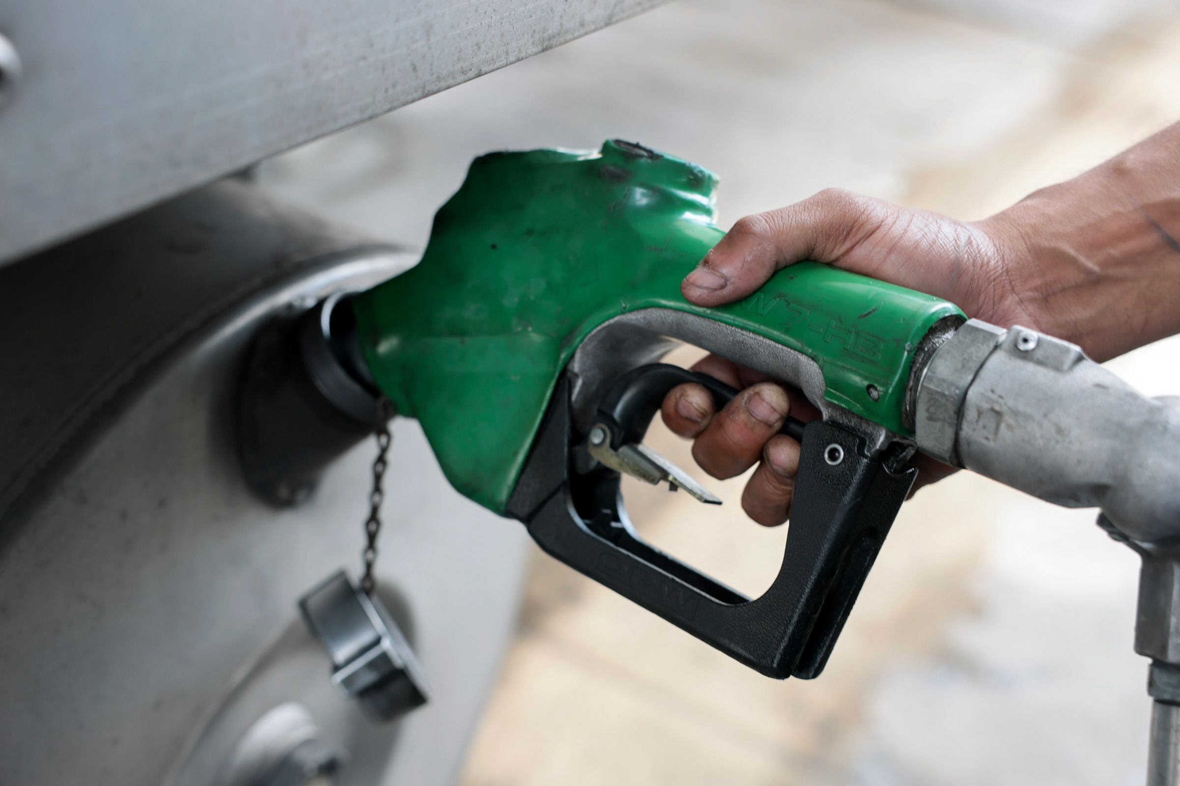 A person pumps diesel fuel into his tractor-trailer at a truck stop on September 11, 2026 in Miami, Florida.