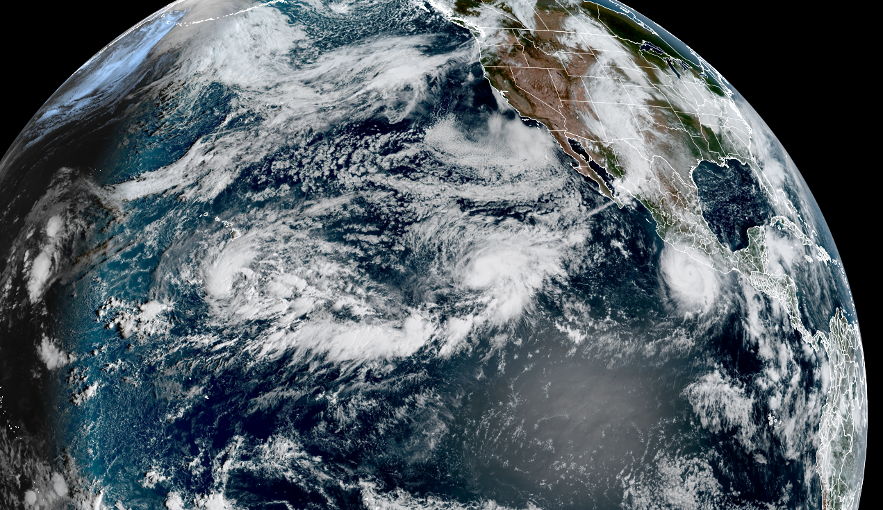 Three tropical systems were active in the central and eastern Pacific Ocean on Wednesday. Tropical Depression 15E was south of Hawaii, Hurricane Polo was near Mexico and Hurricane Odalys was between the two in the open ocean.