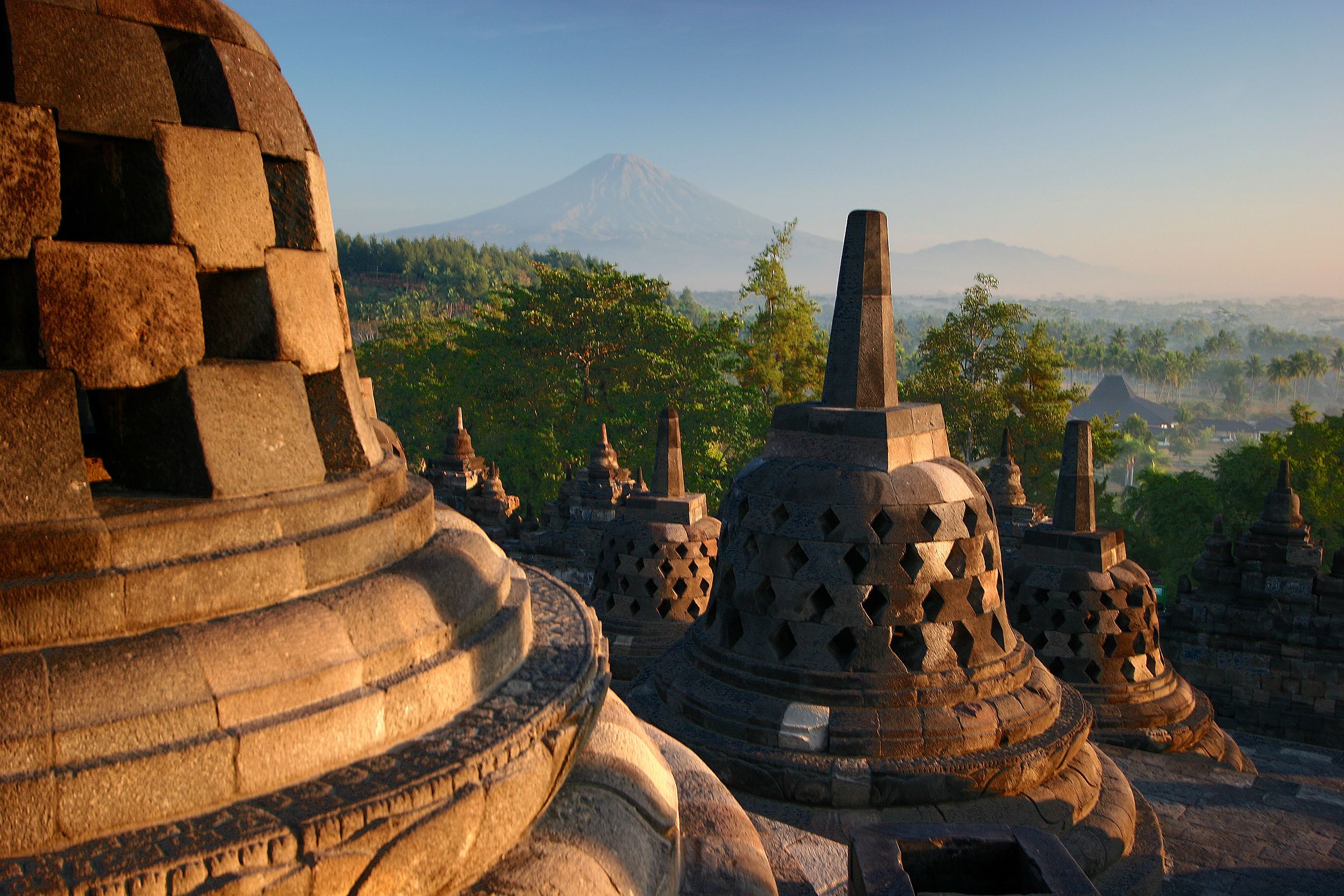 Stupas on top of Borobudur temple, early morning light.  A UNESCO World Heritage site, built between the years 750 and 850.  Visibly some of the restoration does not look very authentic, especially the tops of the stupas, look almost concrete.  An interesting site, but does not compare in my opinion to Bagan or Angkor, as suggested by guidebooks.