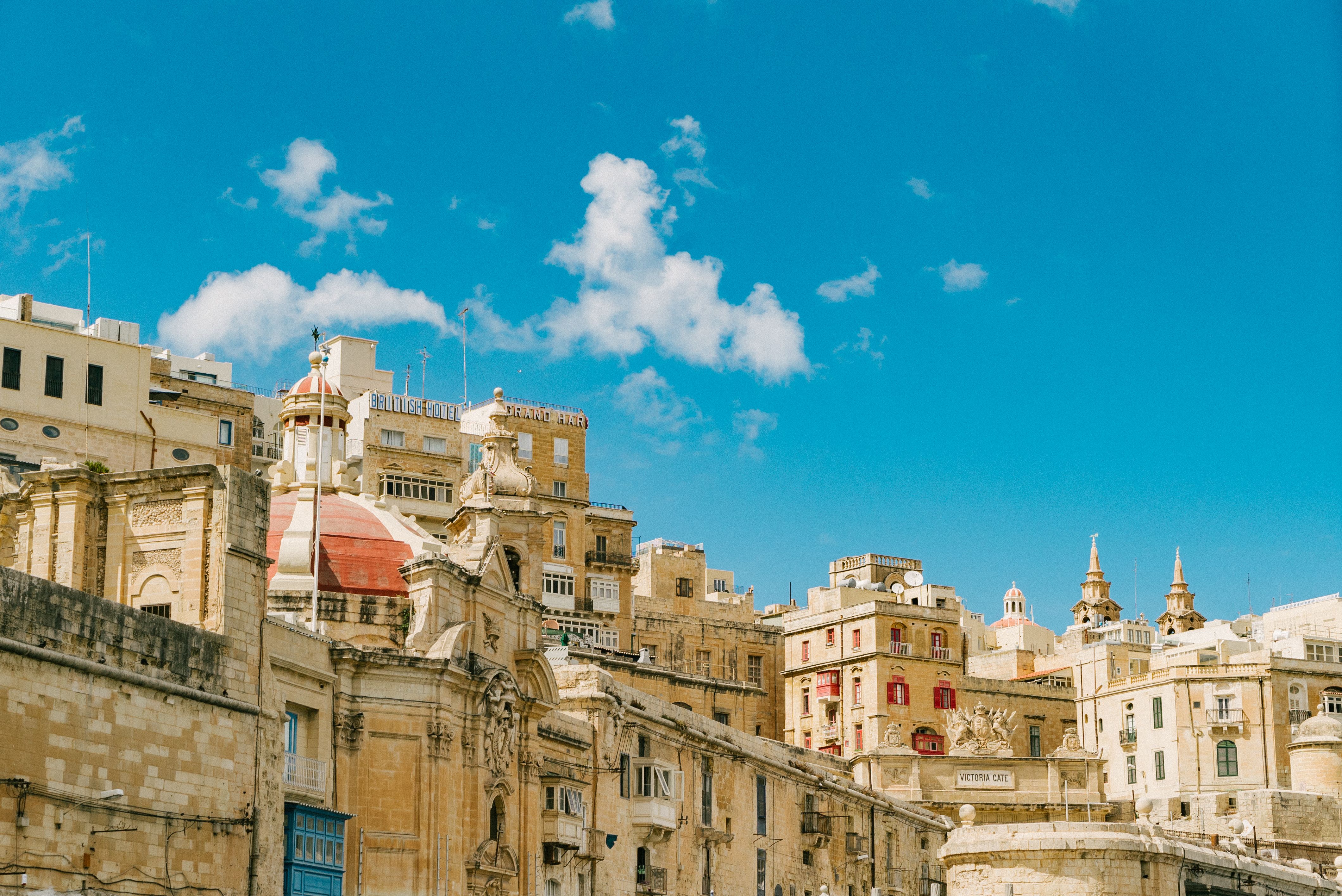 The Valletta waterfront skyline seen from a boat in Malta on