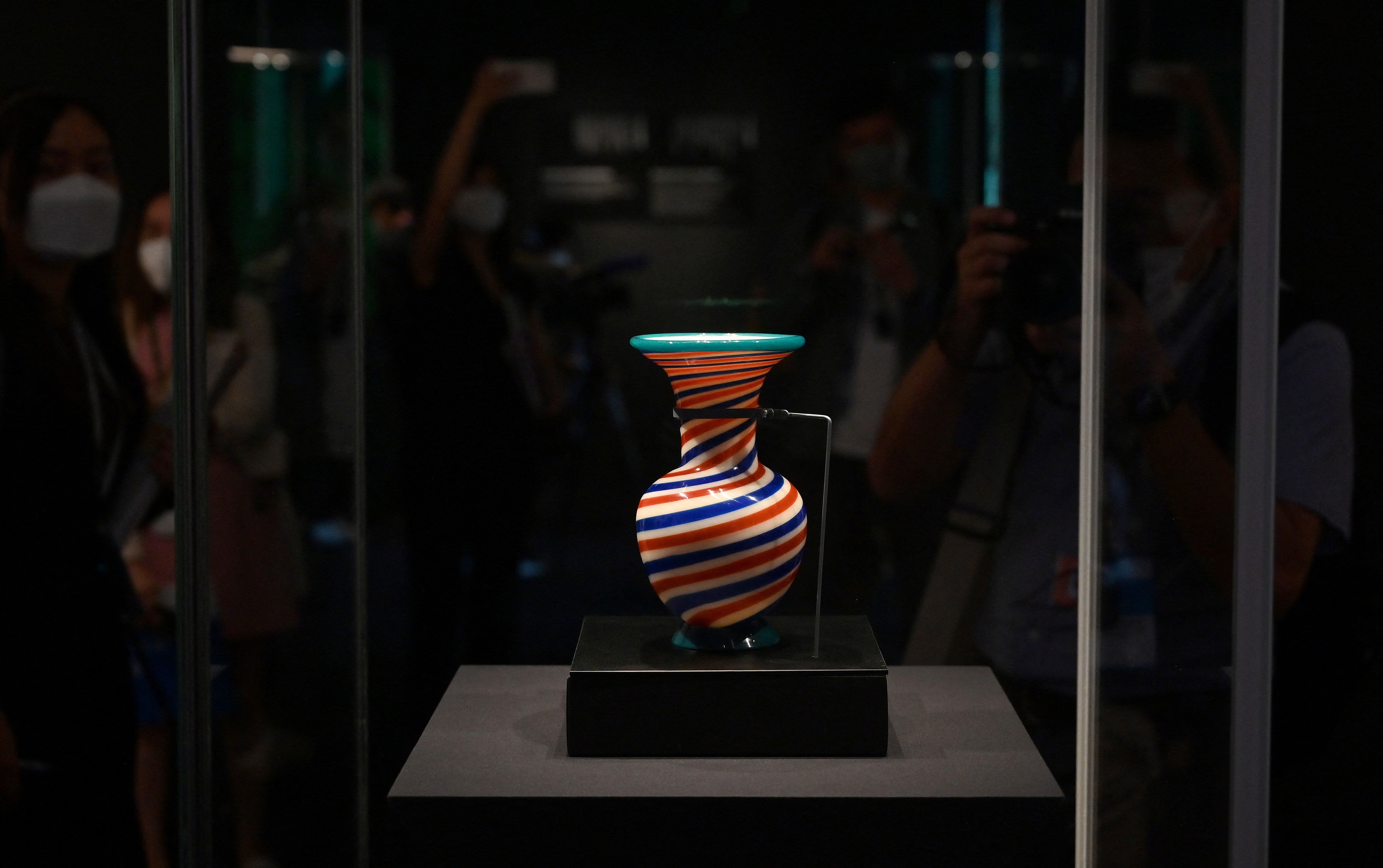 A vase from the Qing Dynasty Qianlong period (1736-1795) is displayed during a media preview of the Hong Kong Palace Museum in Hong Kong on June 22, 2022.