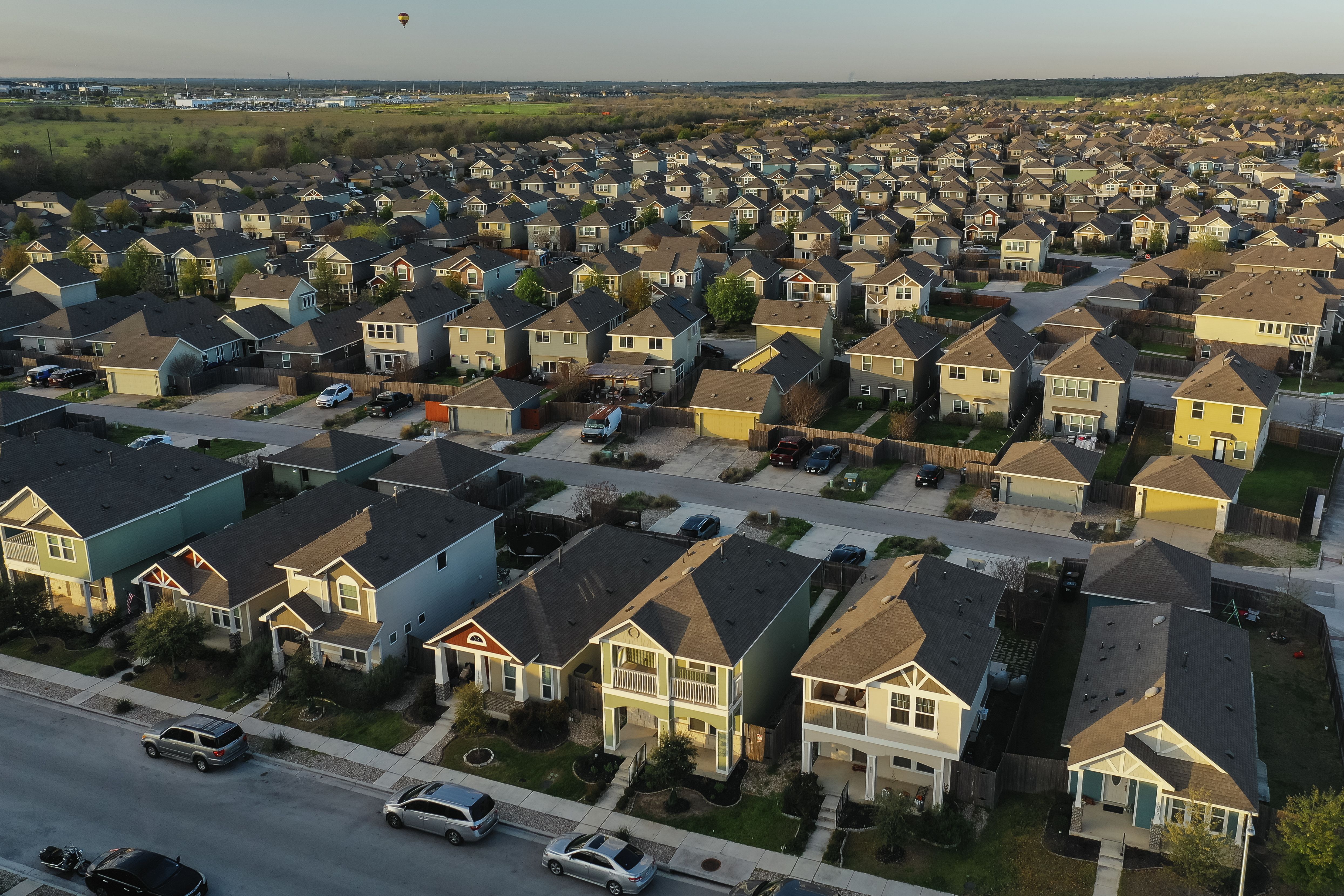 Single family homes in a residential neighborhood in San Marcos, Texas, US, on Tuesday, March 12, 2024. The National Association of Realtors is scheduled to release existing homes sales figures on March 21.