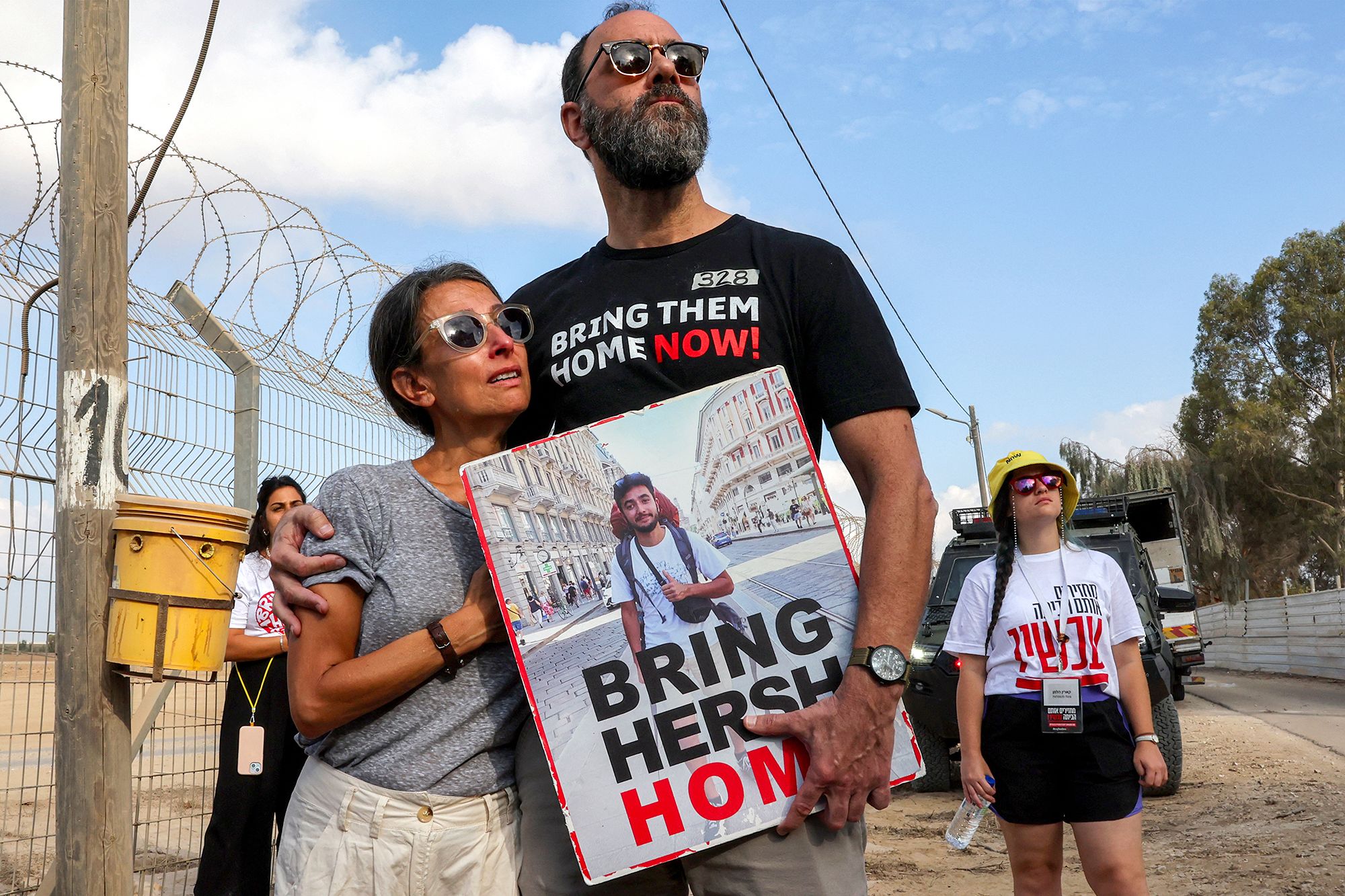 TOPSHOT - Jonathan Polin and Rachel Goldberg, parents of Israeli hostage Hersh Goldberg-Polin, attend a demonstration by the families of the hostages taken captive in the Gaza Strip since the October 7 attacks by Palestinian militants calling for the hostages' release, near Kibbutz Nirim in southern Israel by the border with Gaza on August 29, 2024 amid the ongoing conflict in the Palestinian territory between Israel and Hamas. (Photo by JACK GUEZ / AFP) (Photo by JACK GUEZ/AFP via Getty Images)
