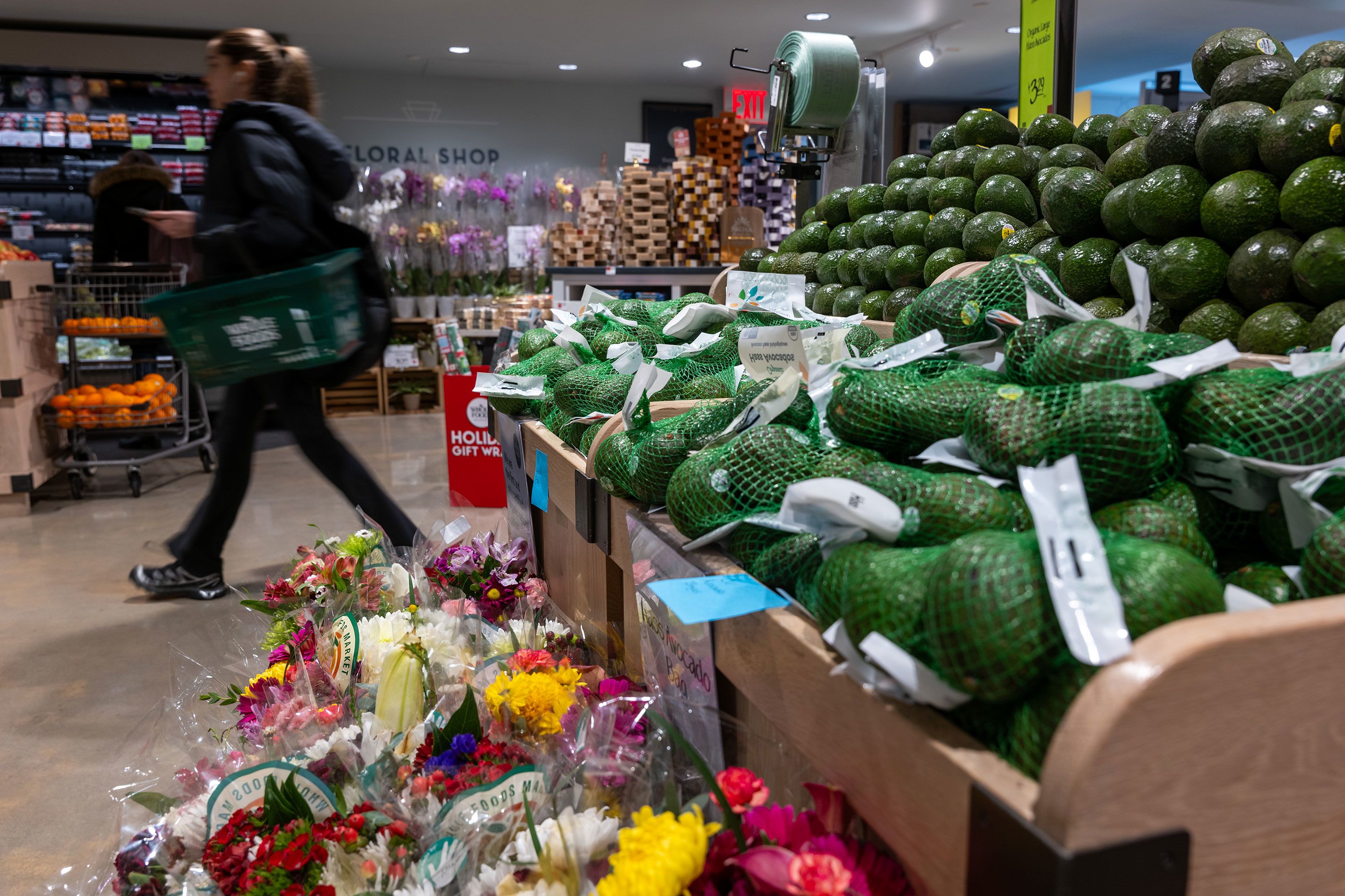A person shops at a Whole Foods Market grocery store in December 2024, in New York.