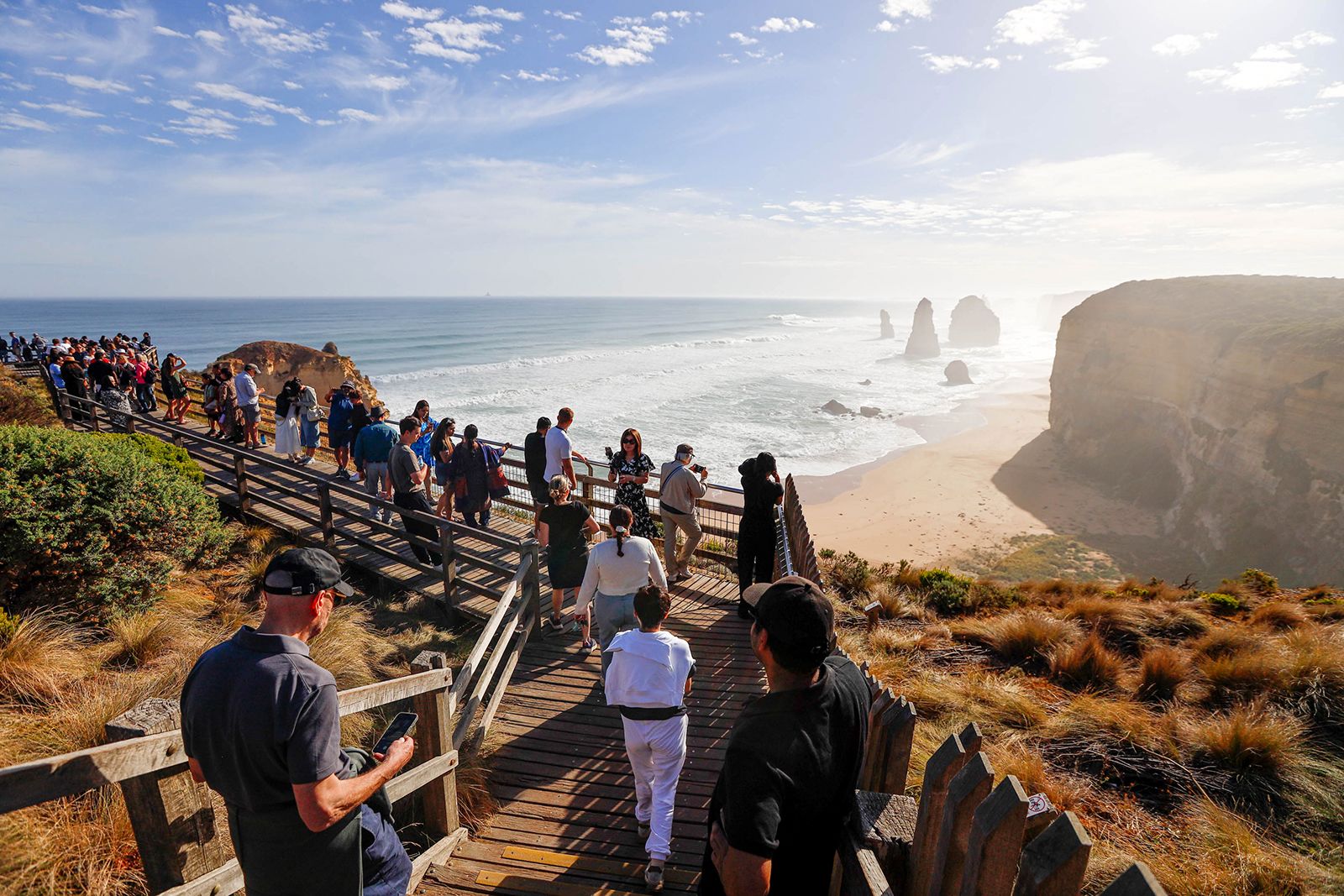 Tourists gather to view the Twelve Apostles in Victoria on April 12, 2025.