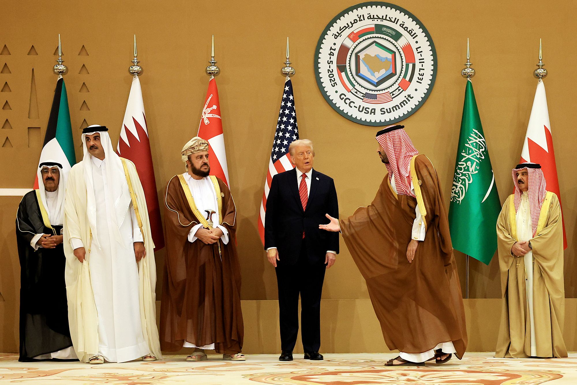 US President Donald Trump and Saudi Crown Prince Mohammed bin Salman prepare to pose for photos with leaders during the Gulf Cooperation Council (GCC) Leaders’ Summit at The Ritz-Carlton on May 14, 2025 in Riyadh, Saudi Arabia.